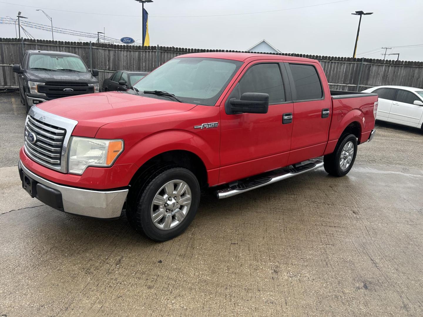 2010 Red Ford F-150 Lariat SuperCrew 5.5-ft. Bed 2WD (1FTEW1C81AF) with an 4.6L V8 SOHC 24V engine, 4-Speed Automatic transmission, located at 1687 Business 35 S, New Braunfels, TX, 78130, (830) 625-7159, 29.655487, -98.051491 - Photo#0