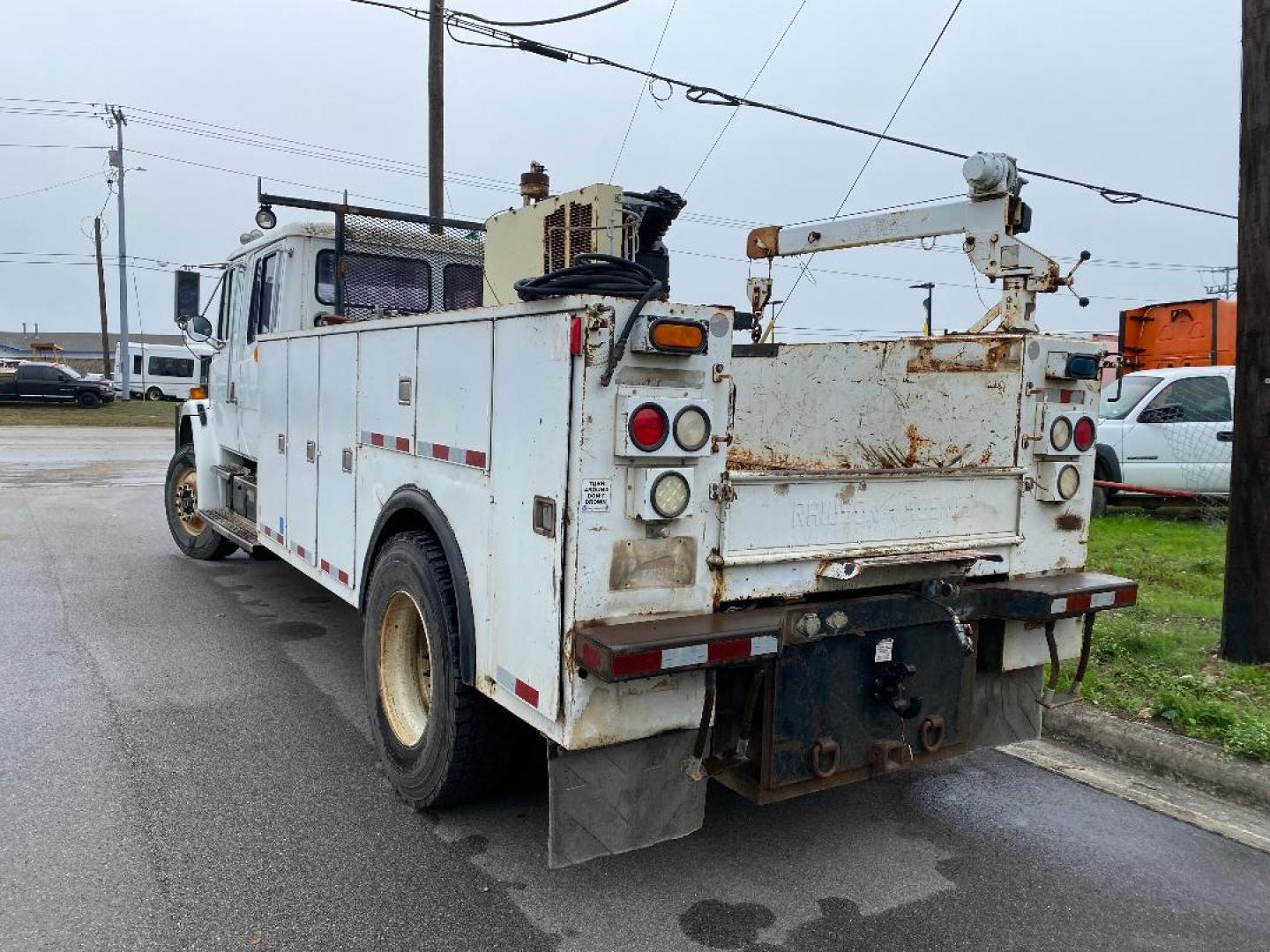 2002 White /Gray Freightliner FL70 - (1FVABTAK82H) with an 7.2L L6 DIESEL engine, located at 1687 Business 35 S, New Braunfels, TX, 78130, (830) 625-7159, 29.655487, -98.051491 - Photo#2