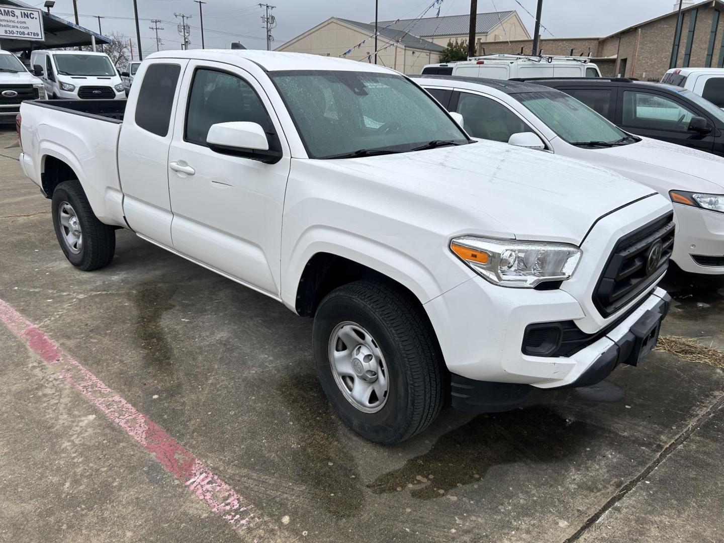 2021 White Toyota Tacoma SR5 Access Cab I4 6AT 2WD (3TYRX5GN6MT) with an 2.7L L4 DOHC 16V engine, 6A transmission, located at 1687 Business 35 S, New Braunfels, TX, 78130, (830) 625-7159, 29.655487, -98.051491 - Photo#2