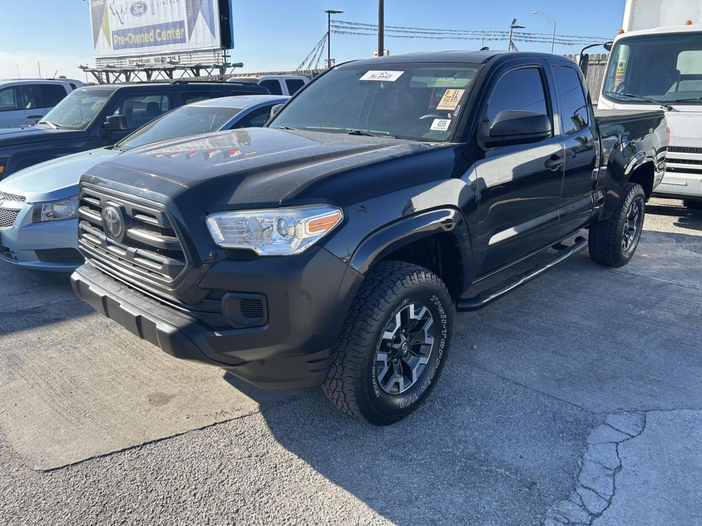 2018 Black Toyota Tacoma SR5 Access Cab I4 6AT 2WD (5TFRX5GN9JX) with an 2.7L L4 DOHC 16V engine, 6A transmission, located at 1687 Business 35 S, New Braunfels, TX, 78130, (830) 625-7159, 29.655487, -98.051491 - Photo#0