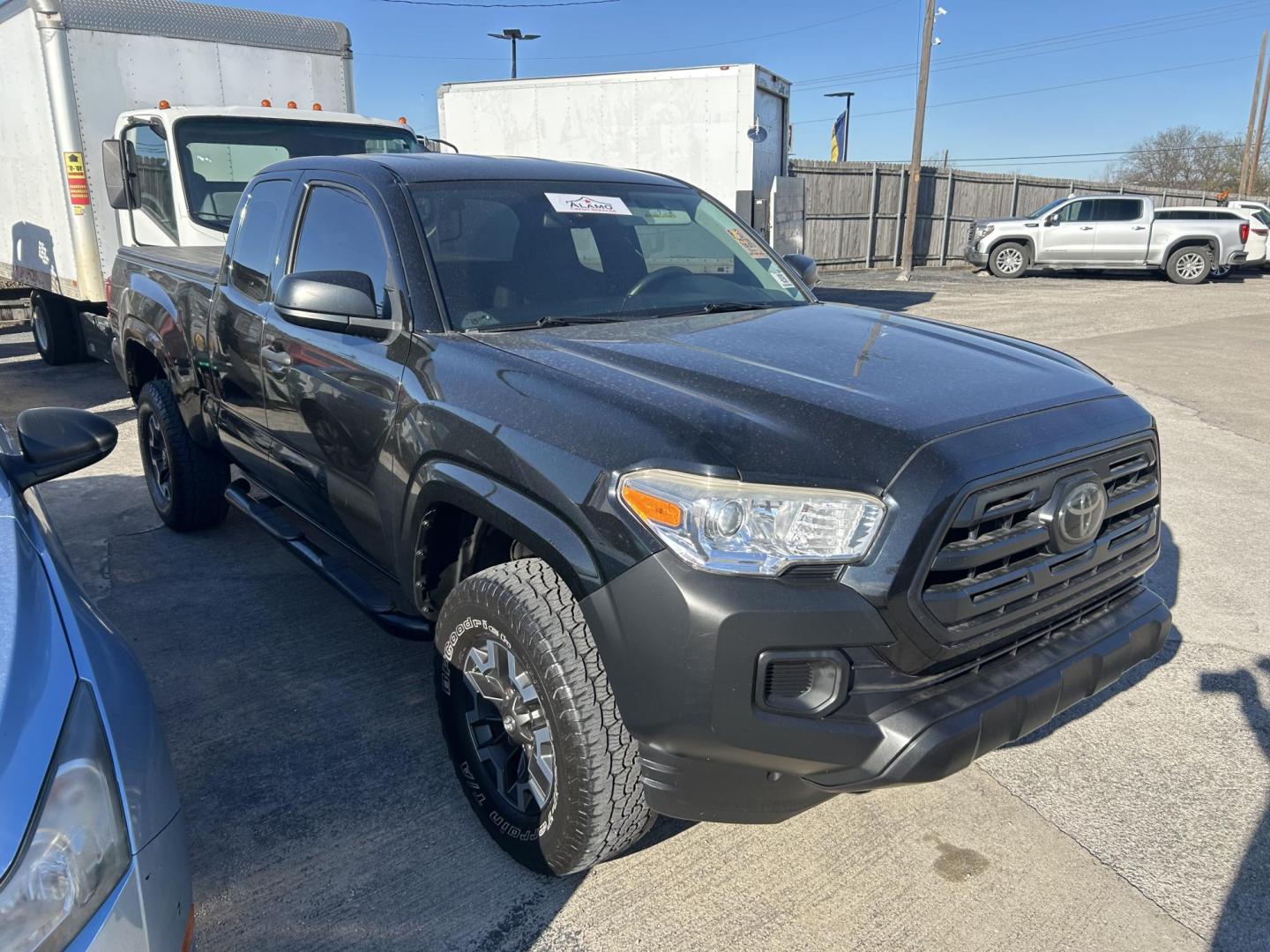 2018 Black Toyota Tacoma SR5 Access Cab I4 6AT 2WD (5TFRX5GN9JX) with an 2.7L L4 DOHC 16V engine, 6A transmission, located at 1687 Business 35 S, New Braunfels, TX, 78130, (830) 625-7159, 29.655487, -98.051491 - Photo#2