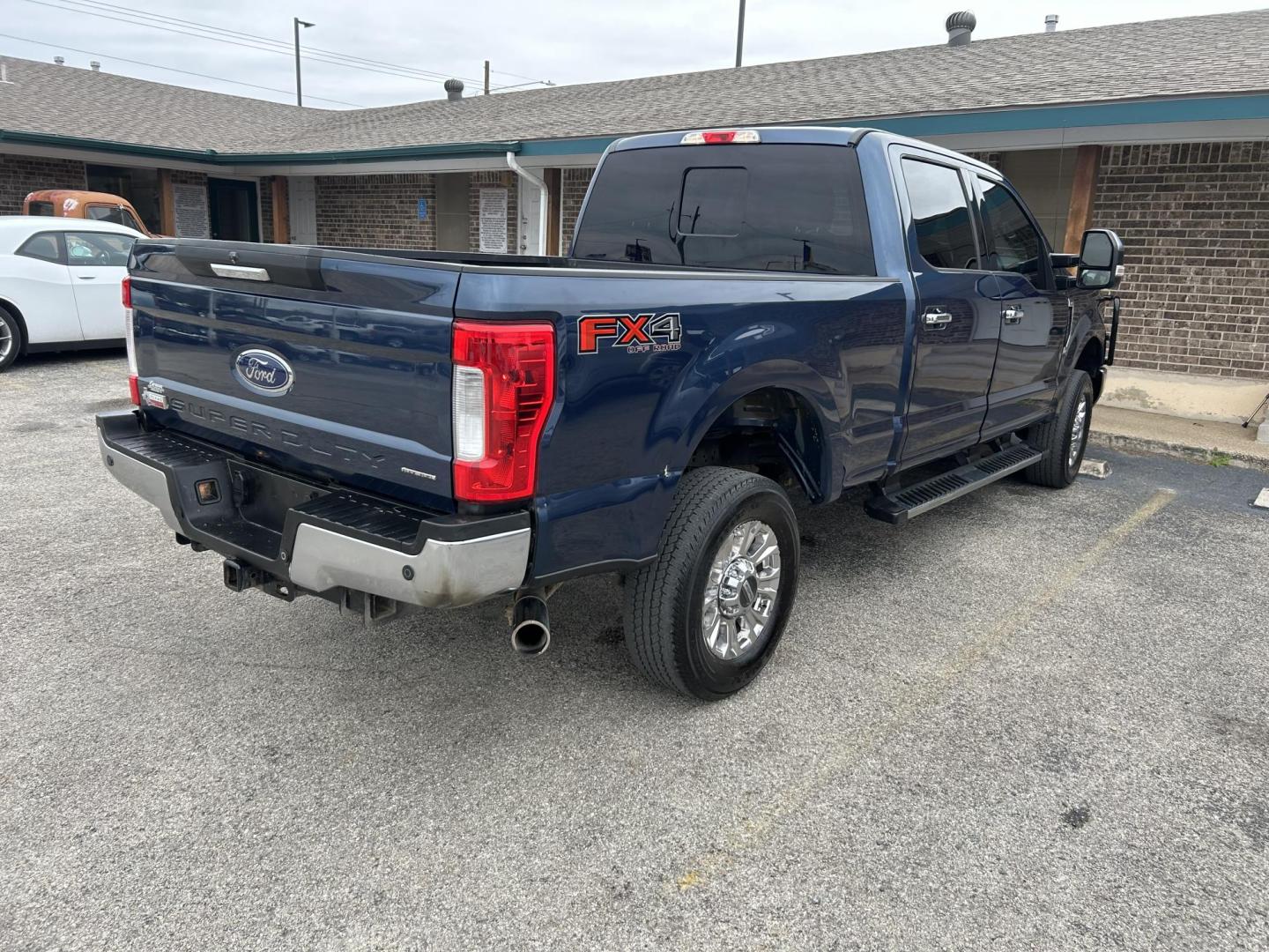 2017 Blue Ford F-250 SD XLT Crew Cab 4WD (1FT7W2B65HE) with an 6.2L V8 OHV 16V engine, 6A transmission, located at 1687 Business 35 S, New Braunfels, TX, 78130, (830) 625-7159, 29.655487, -98.051491 - Photo#3