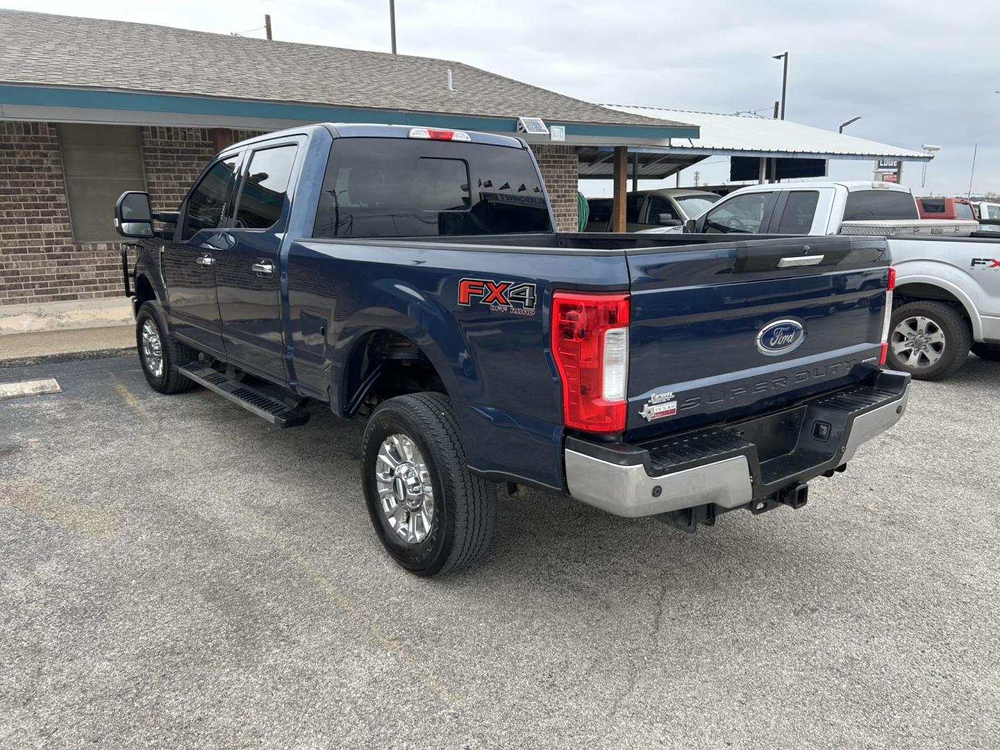 2017 Blue Ford F-250 SD XLT Crew Cab 4WD (1FT7W2B65HE) with an 6.2L V8 OHV 16V engine, 6A transmission, located at 1687 Business 35 S, New Braunfels, TX, 78130, (830) 625-7159, 29.655487, -98.051491 - Photo#1