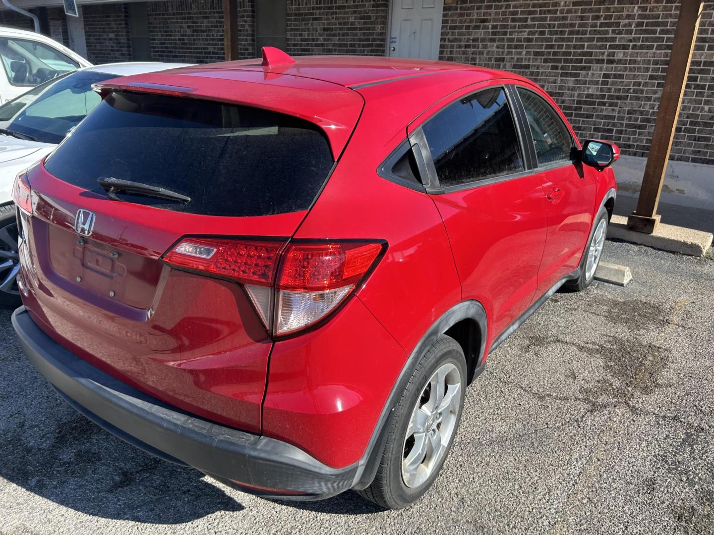 2016 Red Honda HR-V EX 2WD CVT (3CZRU5H50GM) with an 1.8L L4 DOHC 16V engine, Continuously Variable Transmission transmission, located at 1687 Business 35 S, New Braunfels, TX, 78130, (830) 625-7159, 29.655487, -98.051491 - Photo#2