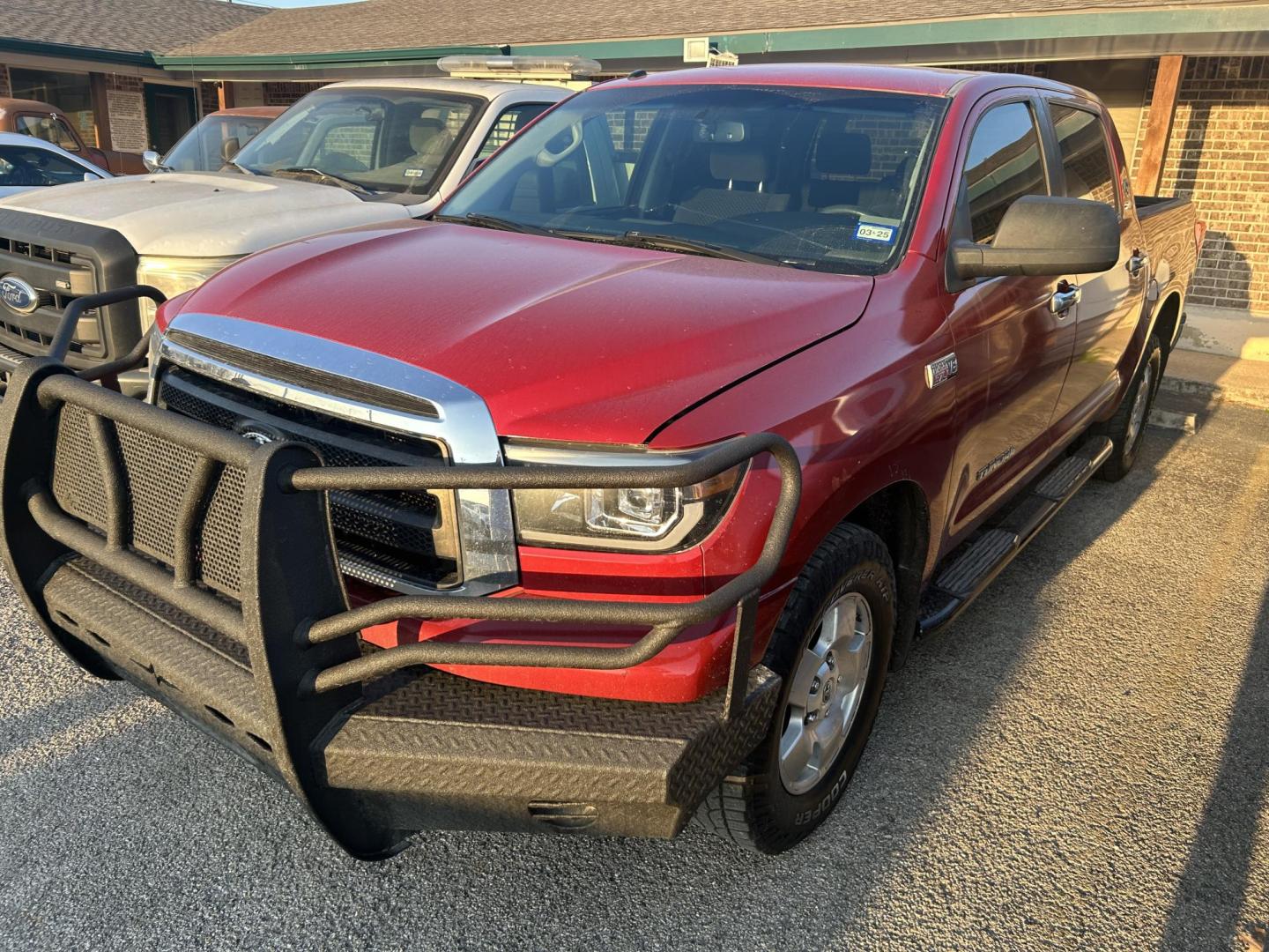 2012 Red Toyota Tundra Tundra-Grade CrewMax 5.7L 2WD (5TFEY5F14CX) with an 5.7L V8 DOHC 32V engine, 6-Speed Automatic Overdrive transmission, located at 1687 Business 35 S, New Braunfels, TX, 78130, (830) 625-7159, 29.655487, -98.051491 - Photo#0