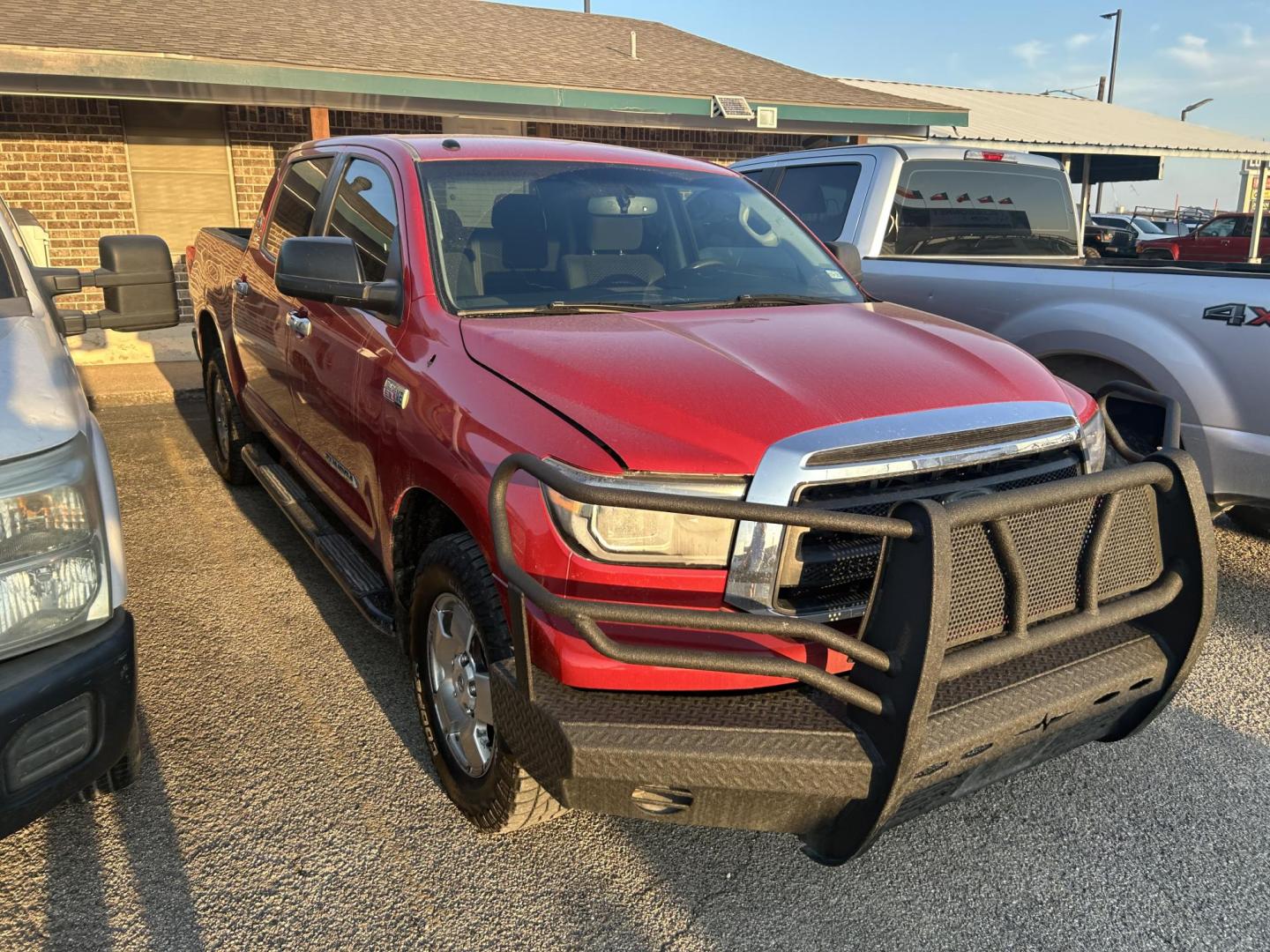 2012 Red Toyota Tundra Tundra-Grade CrewMax 5.7L 2WD (5TFEY5F14CX) with an 5.7L V8 DOHC 32V engine, 6-Speed Automatic Overdrive transmission, located at 1687 Business 35 S, New Braunfels, TX, 78130, (830) 625-7159, 29.655487, -98.051491 - Photo#3