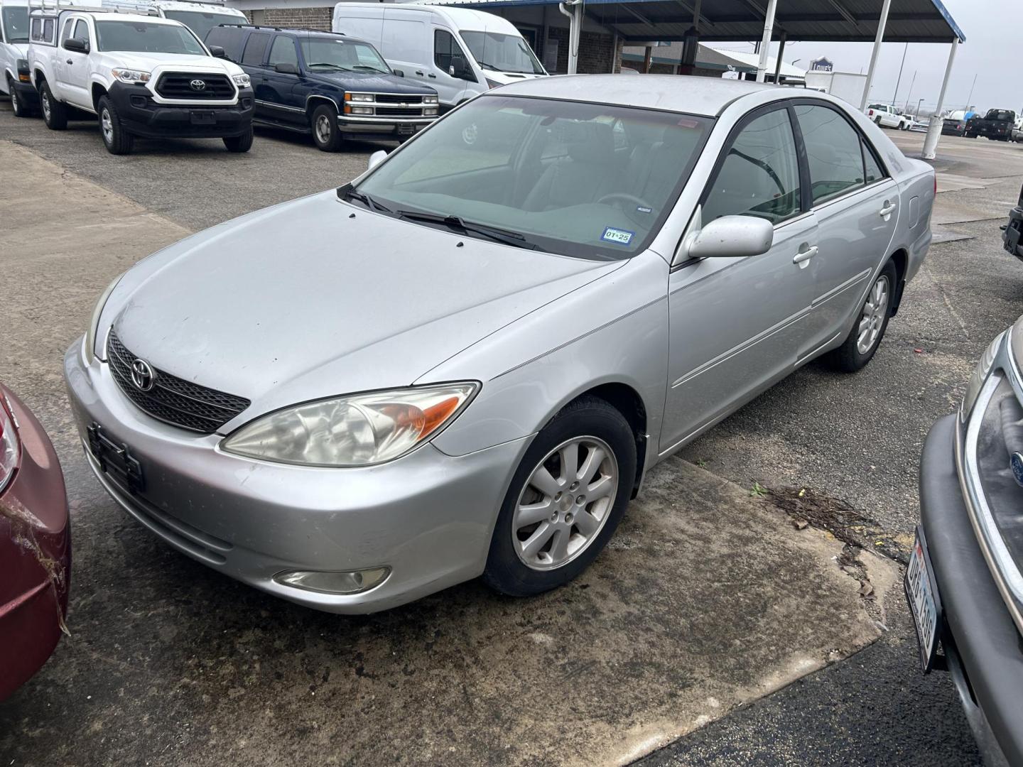 2003 Silver Toyota Camry LE (4T1BE32K73U) with an 2.4L L4 DOHC 16V engine, located at 1687 Business 35 S, New Braunfels, TX, 78130, (830) 625-7159, 29.655487, -98.051491 - Photo#0