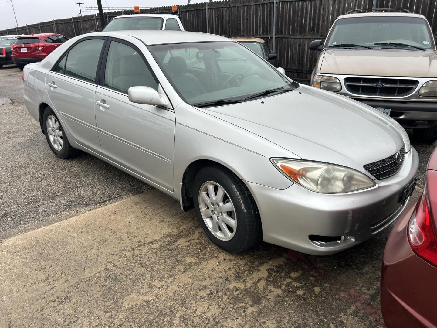 2003 Silver Toyota Camry LE (4T1BE32K73U) with an 2.4L L4 DOHC 16V engine, located at 1687 Business 35 S, New Braunfels, TX, 78130, (830) 625-7159, 29.655487, -98.051491 - Photo#2