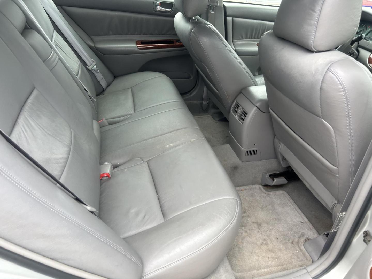 2003 Silver Toyota Camry LE (4T1BE32K73U) with an 2.4L L4 DOHC 16V engine, located at 1687 Business 35 S, New Braunfels, TX, 78130, (830) 625-7159, 29.655487, -98.051491 - Photo#3