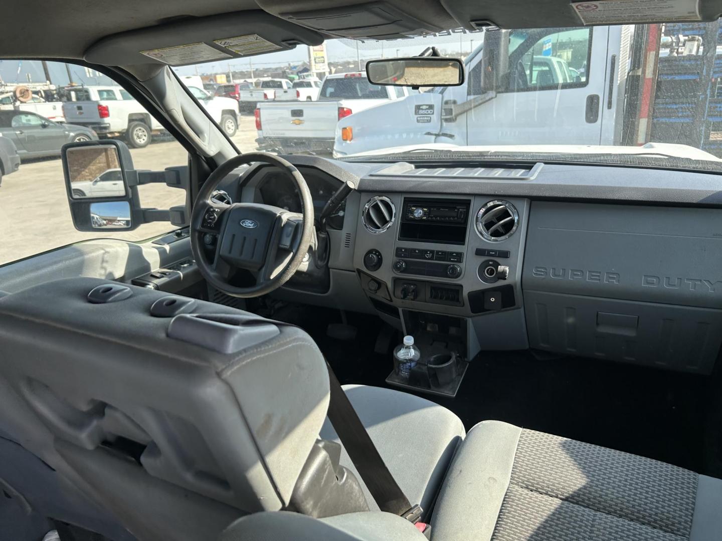 2012 White Ford F-350 SD King Ranch Crew Cab Long Bed DRW 4WD (1FT8W3DT5CE) with an 6.7L V8 OHV 16V DIESEL engine, 6-Speed Automatic transmission, located at 1687 Business 35 S, New Braunfels, TX, 78130, (830) 625-7159, 29.655487, -98.051491 - Photo#4