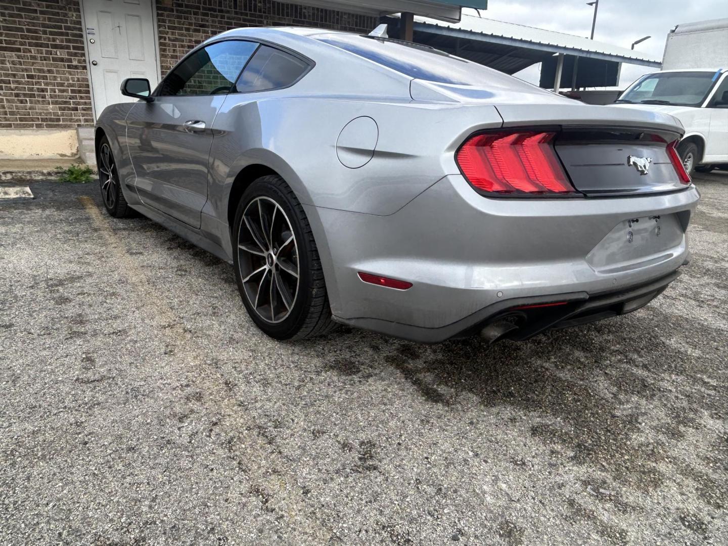 2021 Silver Ford Mustang EcoBoost Coupe (1FA6P8TH7M5) with an 2.3L L4 DOHC 16V engine, located at 1687 Business 35 S, New Braunfels, TX, 78130, (830) 625-7159, 29.655487, -98.051491 - Photo#5