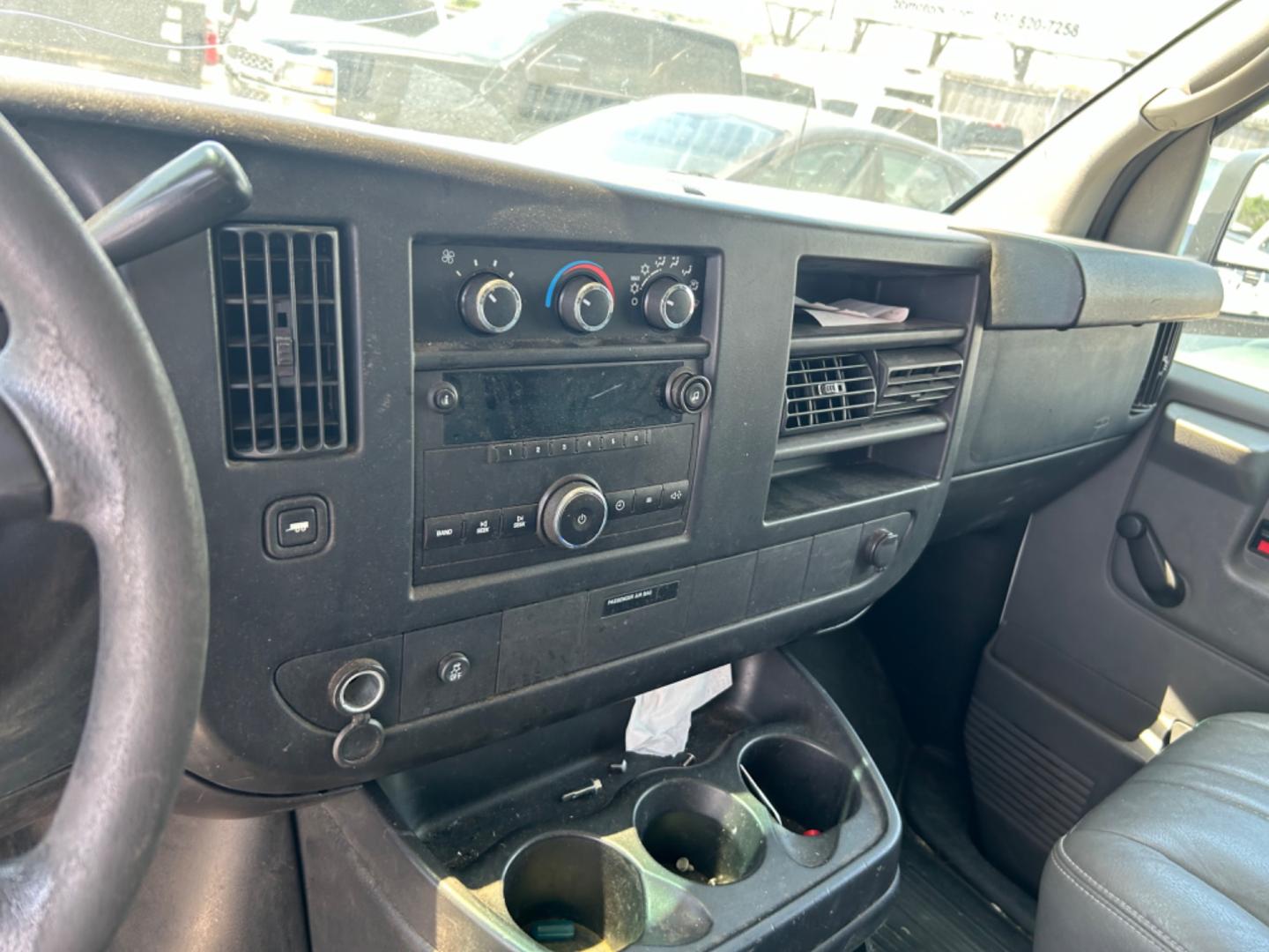 2012 White Chevrolet Express 1500 Cargo (1GCSGAFX8C1) with an 4.3L V6 OHV 12V engine, 4-Speed Automatic transmission, located at 1687 Business 35 S, New Braunfels, TX, 78130, (830) 625-7159, 29.655487, -98.051491 - Photo#15