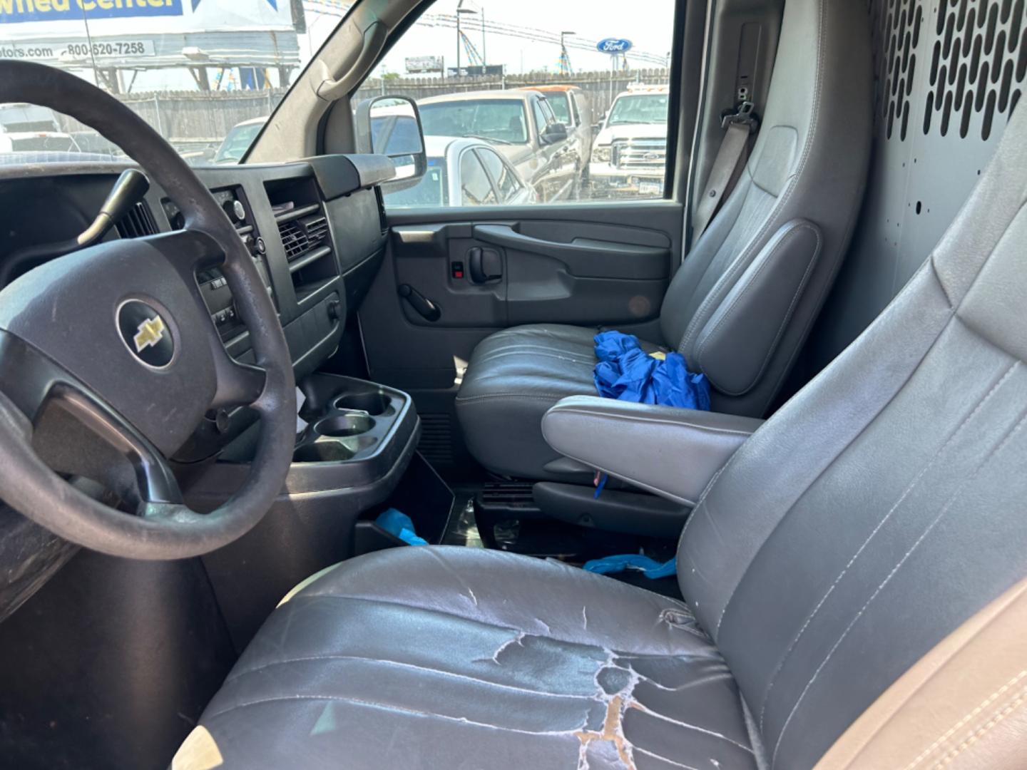 2012 White Chevrolet Express 1500 Cargo (1GCSGAFX8C1) with an 4.3L V6 OHV 12V engine, 4-Speed Automatic transmission, located at 1687 Business 35 S, New Braunfels, TX, 78130, (830) 625-7159, 29.655487, -98.051491 - Photo#13