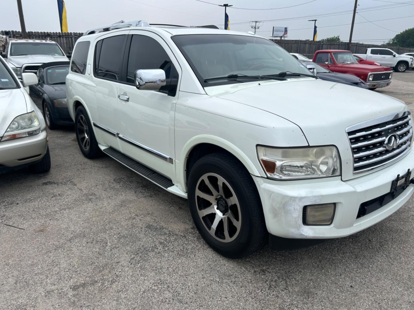 2010 White Infiniti QX56 RWD (5N3ZA0NFXAN) with an 5.6L V8 DOHC 32V engine, 5-Speed Automatic transmission, located at 1687 Business 35 S, New Braunfels, TX, 78130, (830) 625-7159, 29.655487, -98.051491 - Photo#1