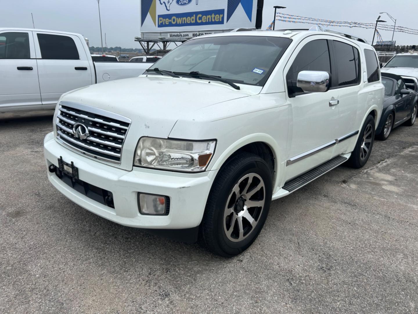 2010 White Infiniti QX56 RWD (5N3ZA0NFXAN) with an 5.6L V8 DOHC 32V engine, 5-Speed Automatic transmission, located at 1687 Business 35 S, New Braunfels, TX, 78130, (830) 625-7159, 29.655487, -98.051491 - Photo#0