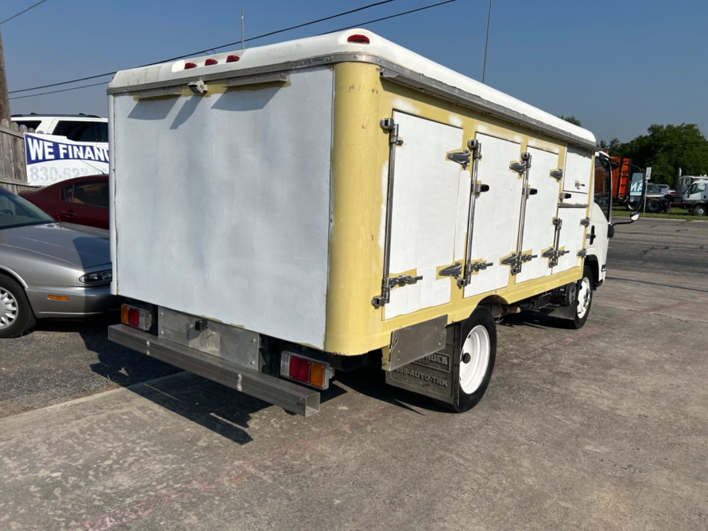 2017 White Isuzu NPR HD - (54DC4W1C9HS) , located at 1687 Business 35 S, New Braunfels, TX, 78130, (830) 625-7159, 29.655487, -98.051491 - Photo#4