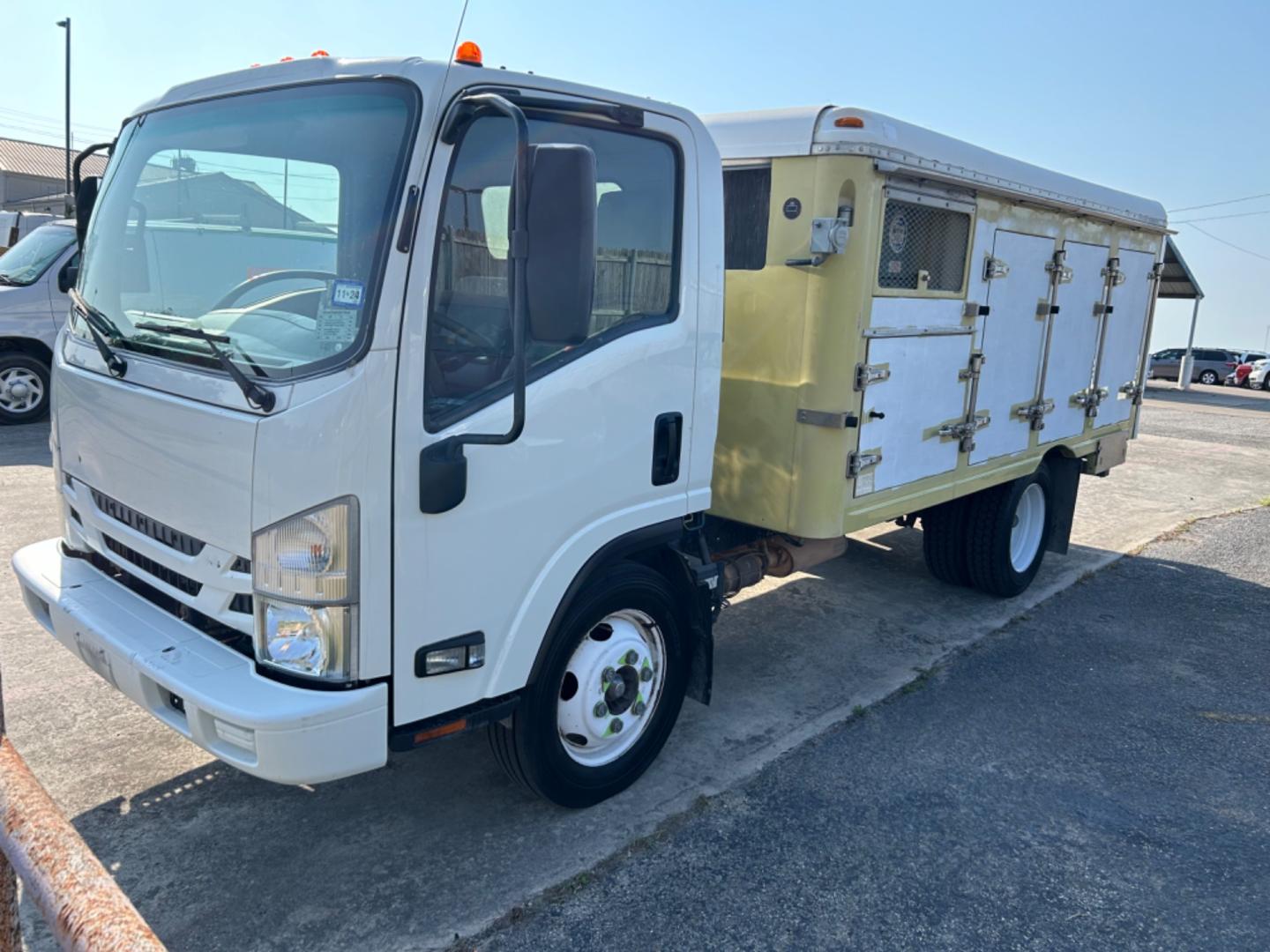 2017 White Isuzu NPR HD - (54DC4W1C9HS) , located at 1687 Business 35 S, New Braunfels, TX, 78130, (830) 625-7159, 29.655487, -98.051491 - Photo#0