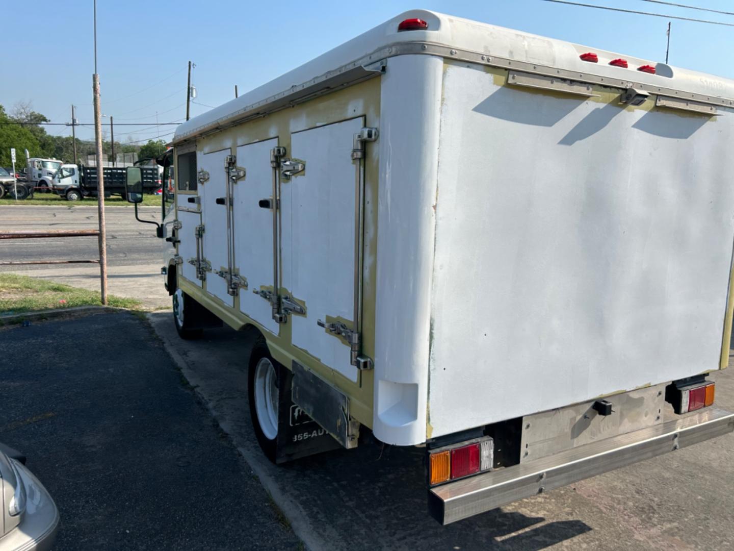 2017 White Isuzu NPR HD - (54DC4W1C9HS) , located at 1687 Business 35 S, New Braunfels, TX, 78130, (830) 625-7159, 29.655487, -98.051491 - Photo#6