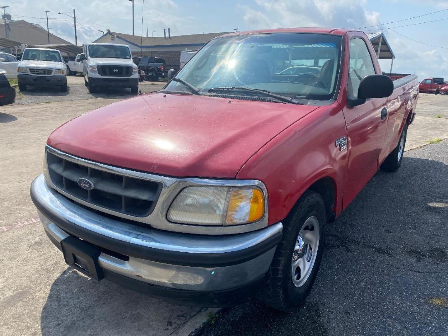 1998 Red /Gray Ford F-150 (1FTZF176XWK) with an 4.6L V8 F engine, Automatic transmission, located at 1687 Business 35 S, New Braunfels, TX, 78130, (830) 625-7159, 29.655487, -98.051491 - Photo#0