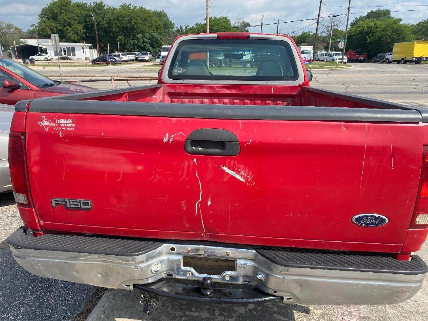 1998 Red /Gray Ford F-150 (1FTZF176XWK) with an 4.6L V8 F engine, Automatic transmission, located at 1687 Business 35 S, New Braunfels, TX, 78130, (830) 625-7159, 29.655487, -98.051491 - Photo#3