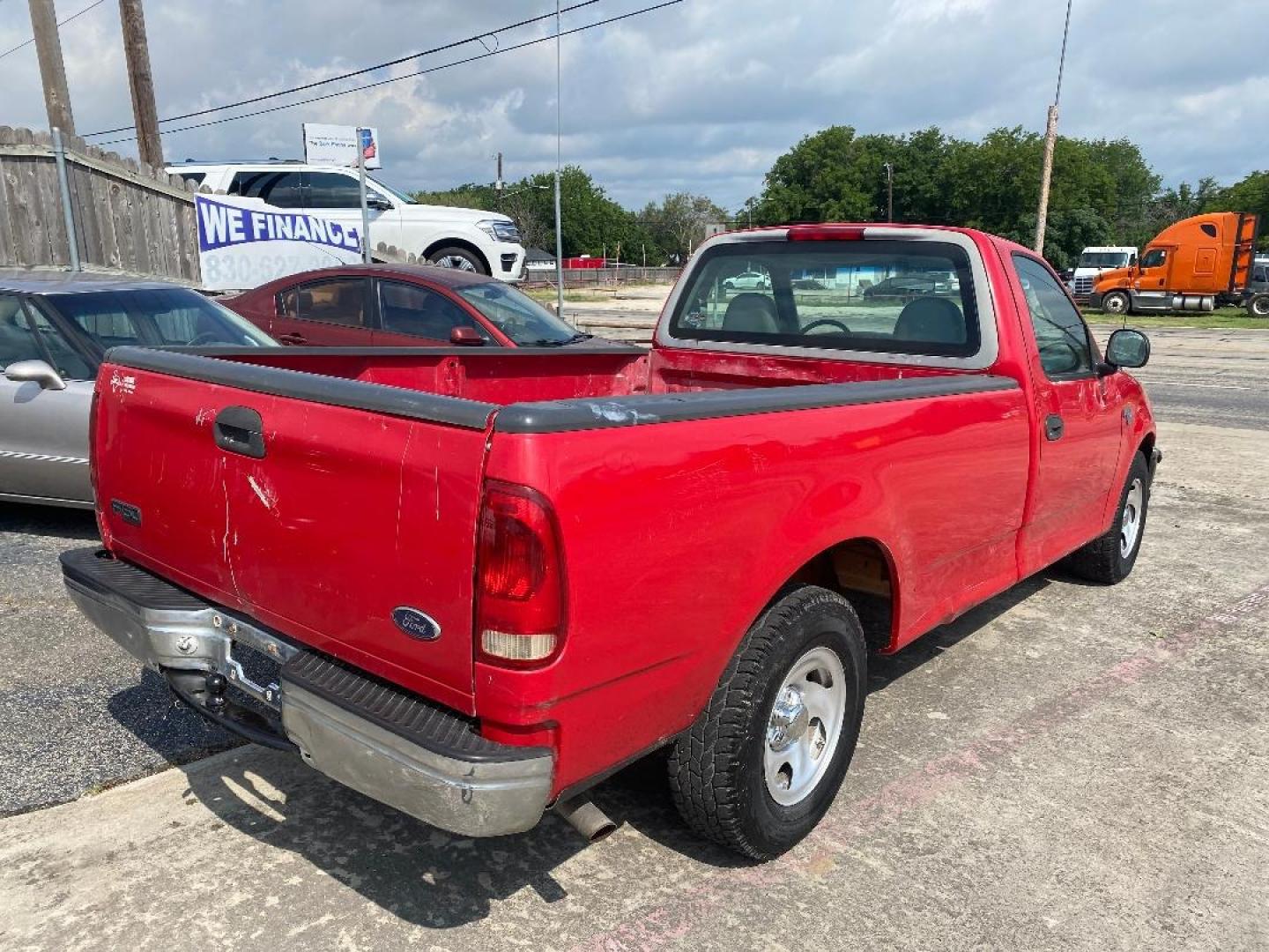 1998 Red /Gray Ford F-150 (1FTZF176XWK) with an 4.6L V8 F engine, Automatic transmission, located at 1687 Business 35 S, New Braunfels, TX, 78130, (830) 625-7159, 29.655487, -98.051491 - Photo#2