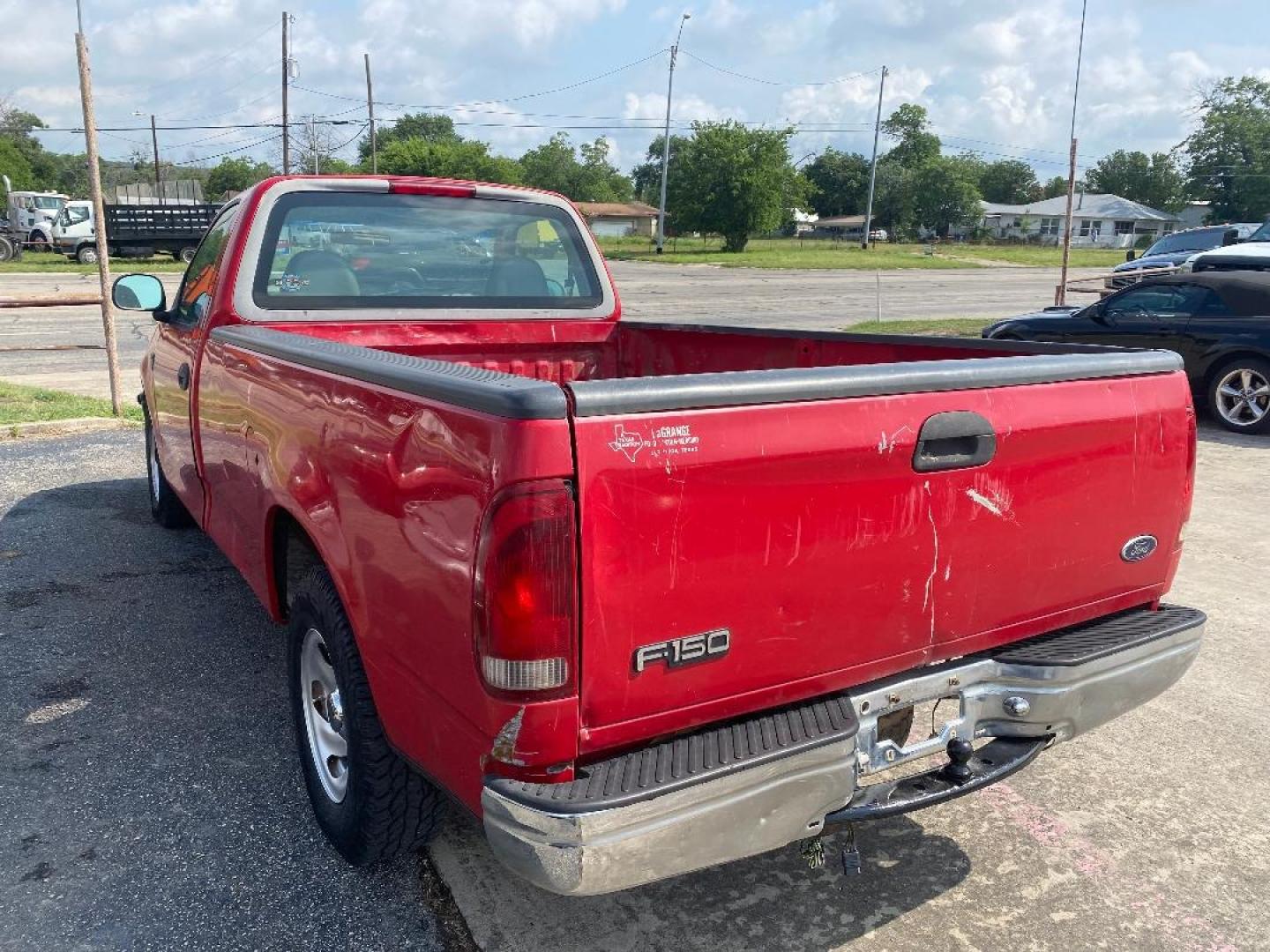 1998 Red /Gray Ford F-150 (1FTZF176XWK) with an 4.6L V8 F engine, Automatic transmission, located at 1687 Business 35 S, New Braunfels, TX, 78130, (830) 625-7159, 29.655487, -98.051491 - Photo#1