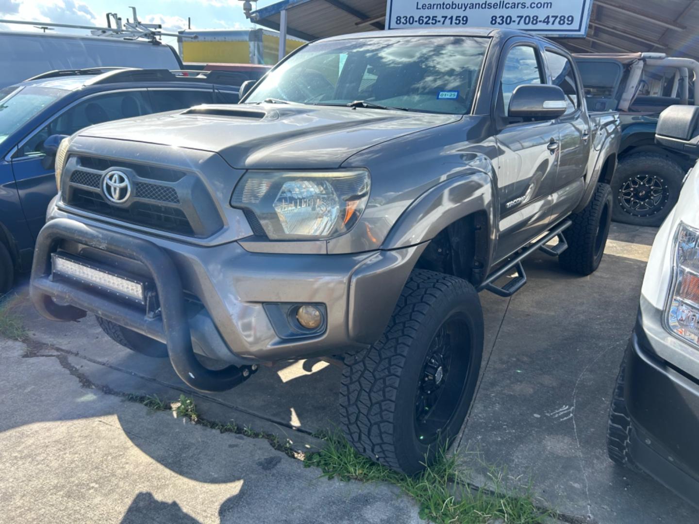 2012 Brown Toyota Tacoma Prerunner (3TMJU4GN9CM) with an 4.0L V6 F DOHC 24V engine, Automatic transmission, located at 1687 Business 35 S, New Braunfels, TX, 78130, (830) 625-7159, 29.655487, -98.051491 - Photo#0