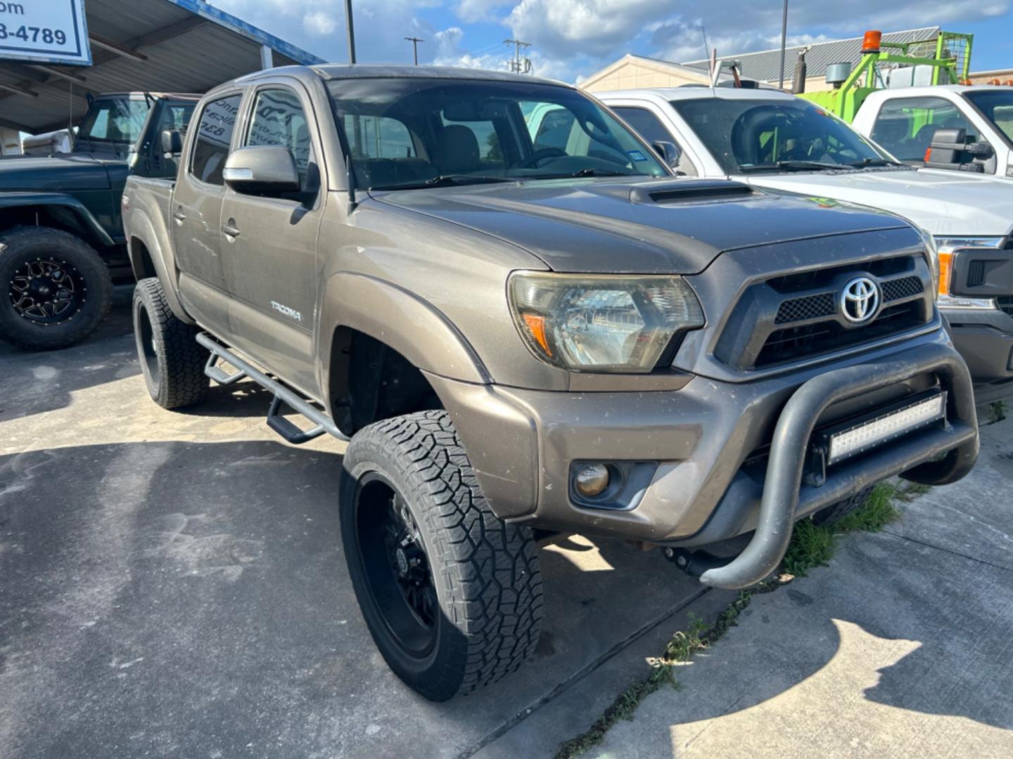 2012 Brown Toyota Tacoma Prerunner (3TMJU4GN9CM) with an 4.0L V6 F DOHC 24V engine, Automatic transmission, located at 1687 Business 35 S, New Braunfels, TX, 78130, (830) 625-7159, 29.655487, -98.051491 - Photo#3