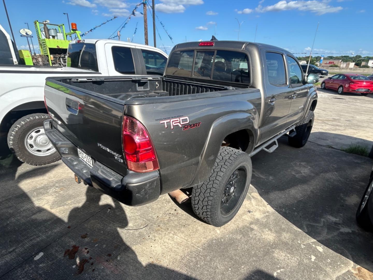 2012 Brown Toyota Tacoma Prerunner (3TMJU4GN9CM) with an 4.0L V6 F DOHC 24V engine, Automatic transmission, located at 1687 Business 35 S, New Braunfels, TX, 78130, (830) 625-7159, 29.655487, -98.051491 - Photo#2