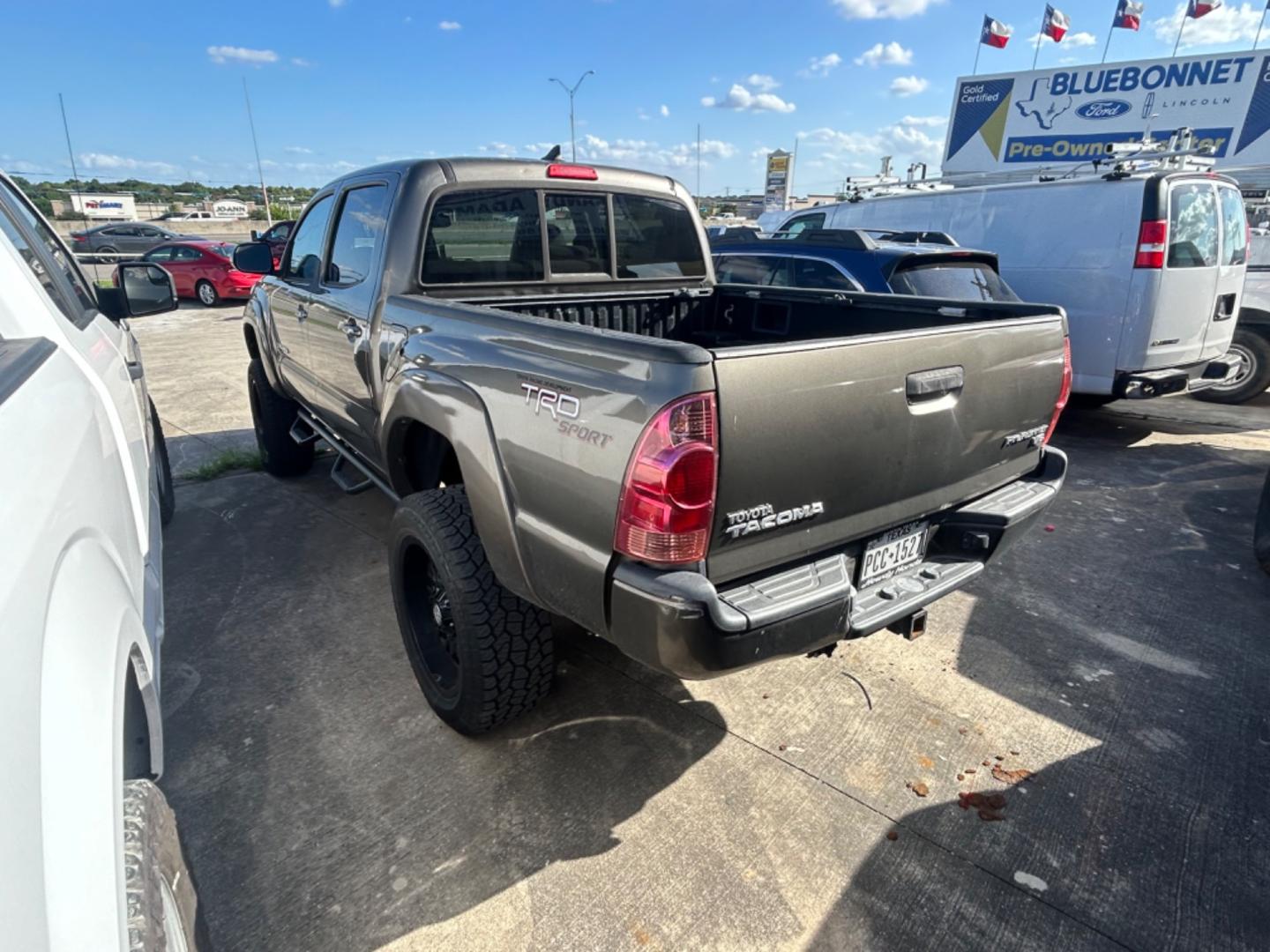 2012 Brown Toyota Tacoma Prerunner (3TMJU4GN9CM) with an 4.0L V6 F DOHC 24V engine, Automatic transmission, located at 1687 Business 35 S, New Braunfels, TX, 78130, (830) 625-7159, 29.655487, -98.051491 - Photo#1