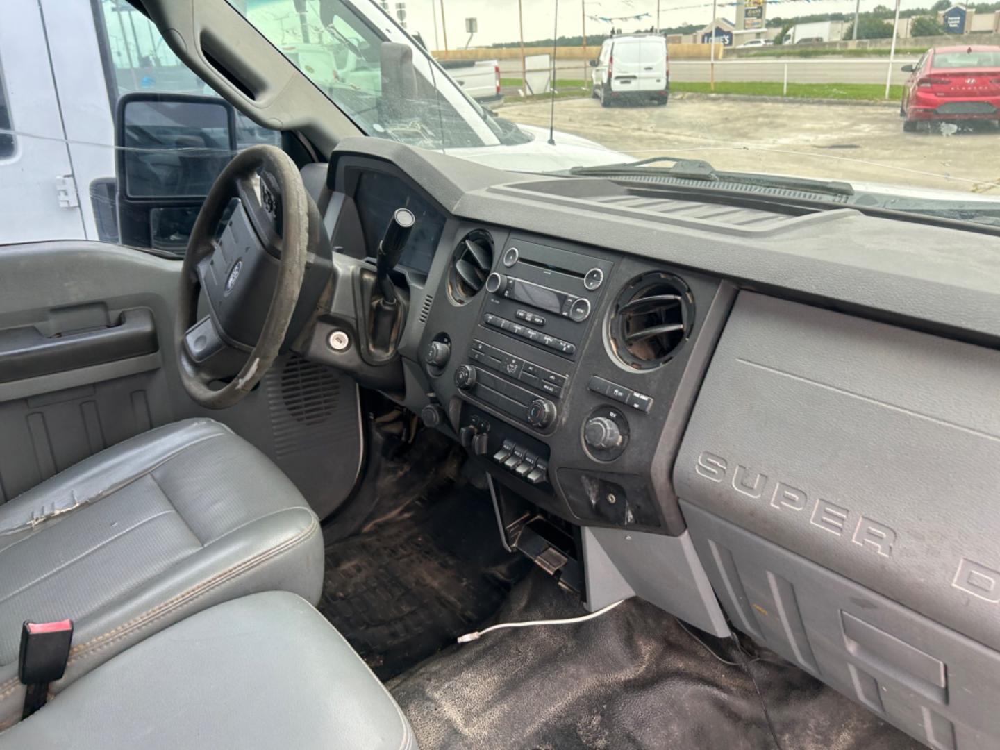 2012 Ford F-250 SD (1FT7X2AT0CE) with an 6.7L V8 F OHV 32V engine, Automatic transmission, located at 1687 Business 35 S, New Braunfels, TX, 78130, (830) 625-7159, 29.655487, -98.051491 - Photo#3