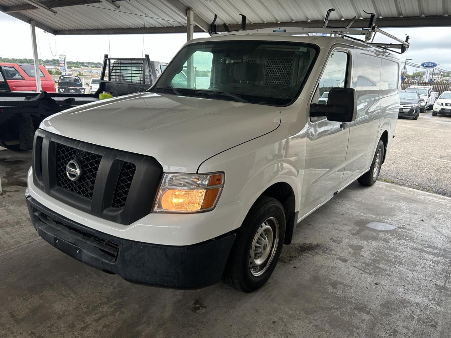 2017 White Nissan NV Cargo (1N6BF0KM1HN) , located at 1687 Business 35 S, New Braunfels, TX, 78130, (830) 625-7159, 29.655487, -98.051491 - Photo#0