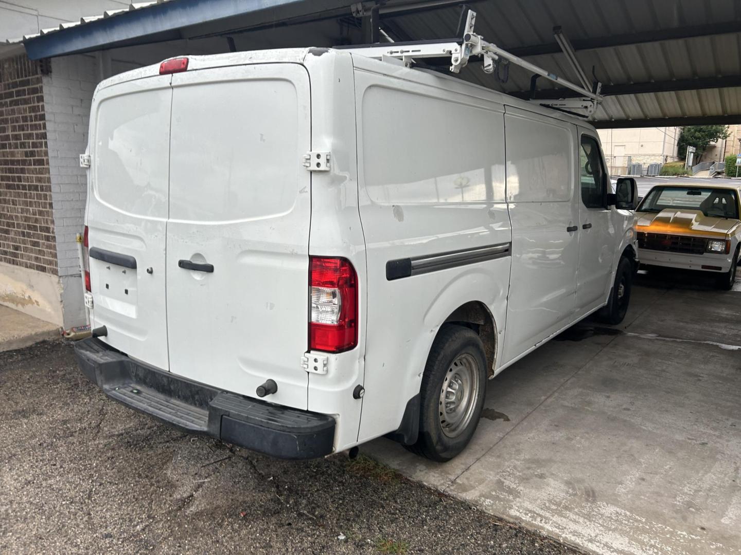 2017 White Nissan NV Cargo (1N6BF0KM1HN) , located at 1687 Business 35 S, New Braunfels, TX, 78130, (830) 625-7159, 29.655487, -98.051491 - Photo#2