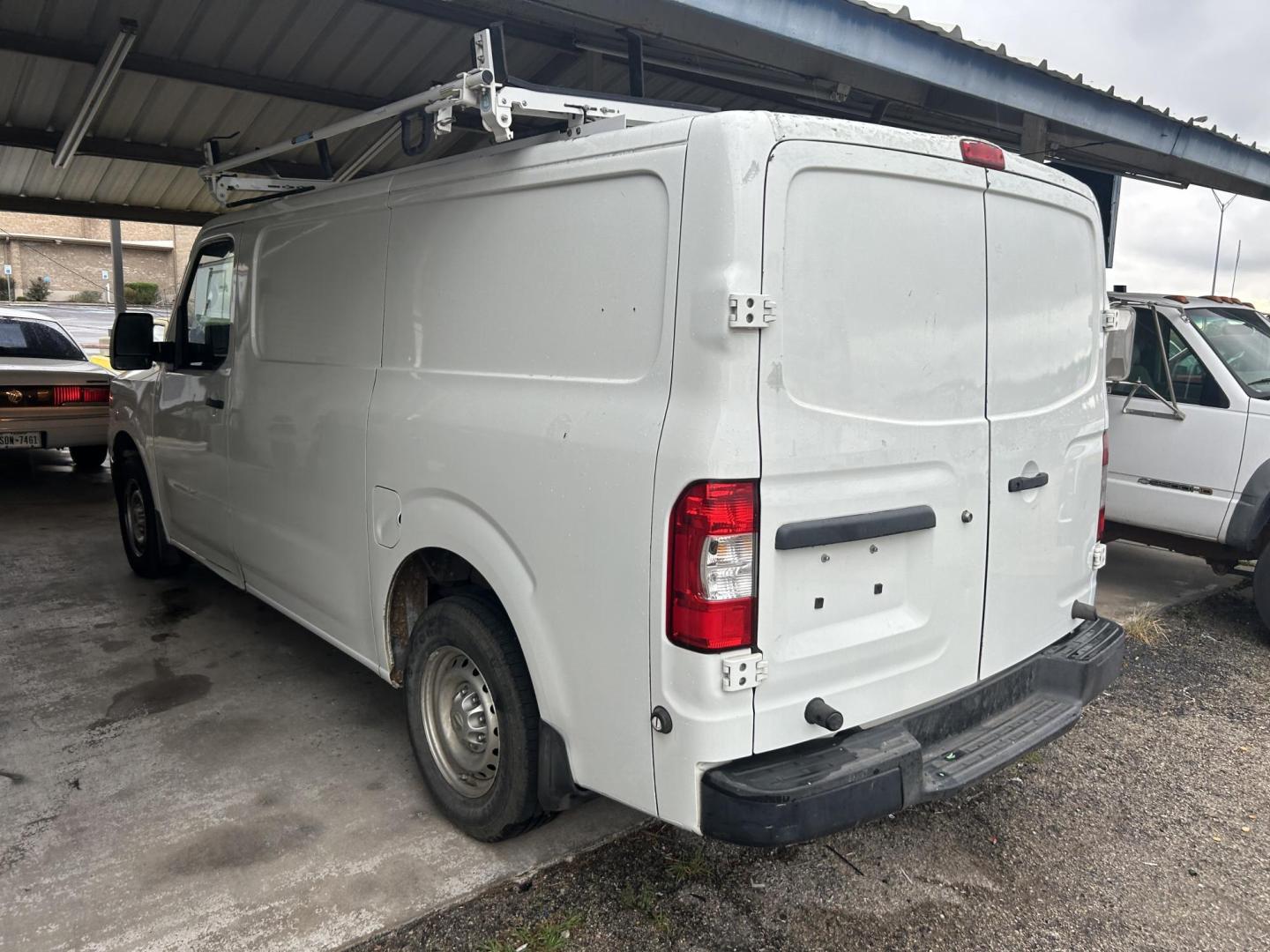 2017 White Nissan NV Cargo (1N6BF0KM1HN) , located at 1687 Business 35 S, New Braunfels, TX, 78130, (830) 625-7159, 29.655487, -98.051491 - Photo#1