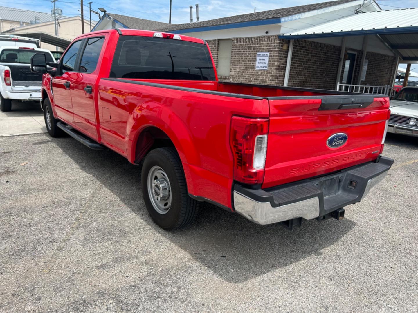 2019 Red Ford F-250 SD Lariat Crew Cab Long Bed 2WD (1FT7W2A60KE) with an 6.2L V8 OHV 16V engine, 6A transmission, located at 1687 Business 35 S, New Braunfels, TX, 78130, (830) 625-7159, 29.655487, -98.051491 - Photo#1