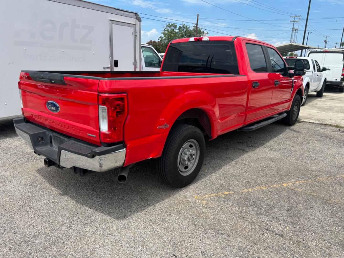 2019 Red Ford F-250 SD Lariat Crew Cab Long Bed 2WD (1FT7W2A60KE) with an 6.2L V8 OHV 16V engine, 6A transmission, located at 1687 Business 35 S, New Braunfels, TX, 78130, (830) 625-7159, 29.655487, -98.051491 - Photo#3