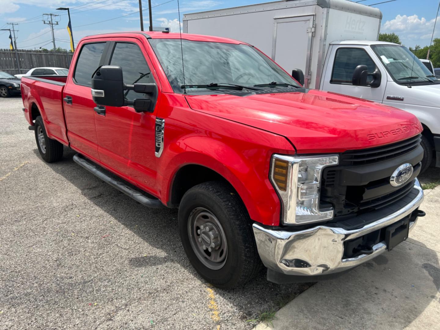 2019 Red Ford F-250 SD Lariat Crew Cab Long Bed 2WD (1FT7W2A60KE) with an 6.2L V8 OHV 16V engine, 6A transmission, located at 1687 Business 35 S, New Braunfels, TX, 78130, (830) 625-7159, 29.655487, -98.051491 - Photo#4