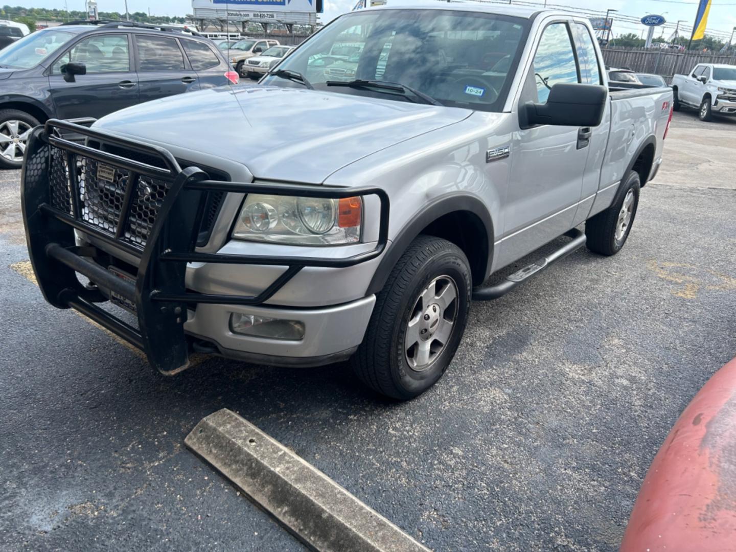 2004 Silver Ford F-150 FX4 4WD (1FTRF14524N) with an 5.4L V6 SOHC 16V engine, 4-Speed Automatic Overdrive transmission, located at 1687 Business 35 S, New Braunfels, TX, 78130, (830) 625-7159, 29.655487, -98.051491 - Photo#0