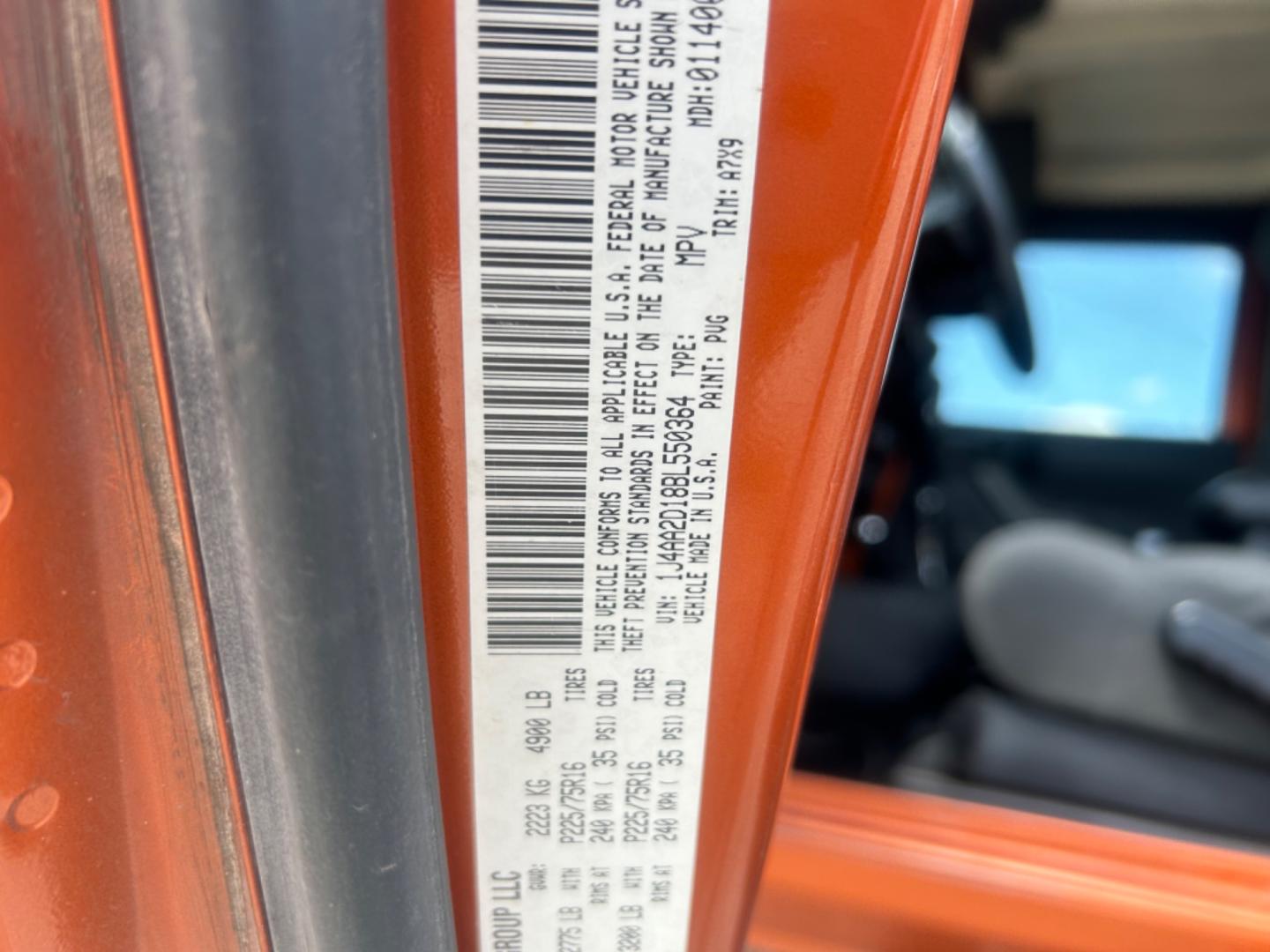 2011 Orange Jeep Wrangler Sport 4WD (1J4AA2D18BL) with an 3.8L V6 OHV 12V engine, Automatic transmission, located at 1687 Business 35 S, New Braunfels, TX, 78130, (830) 625-7159, 29.655487, -98.051491 - Photo#13