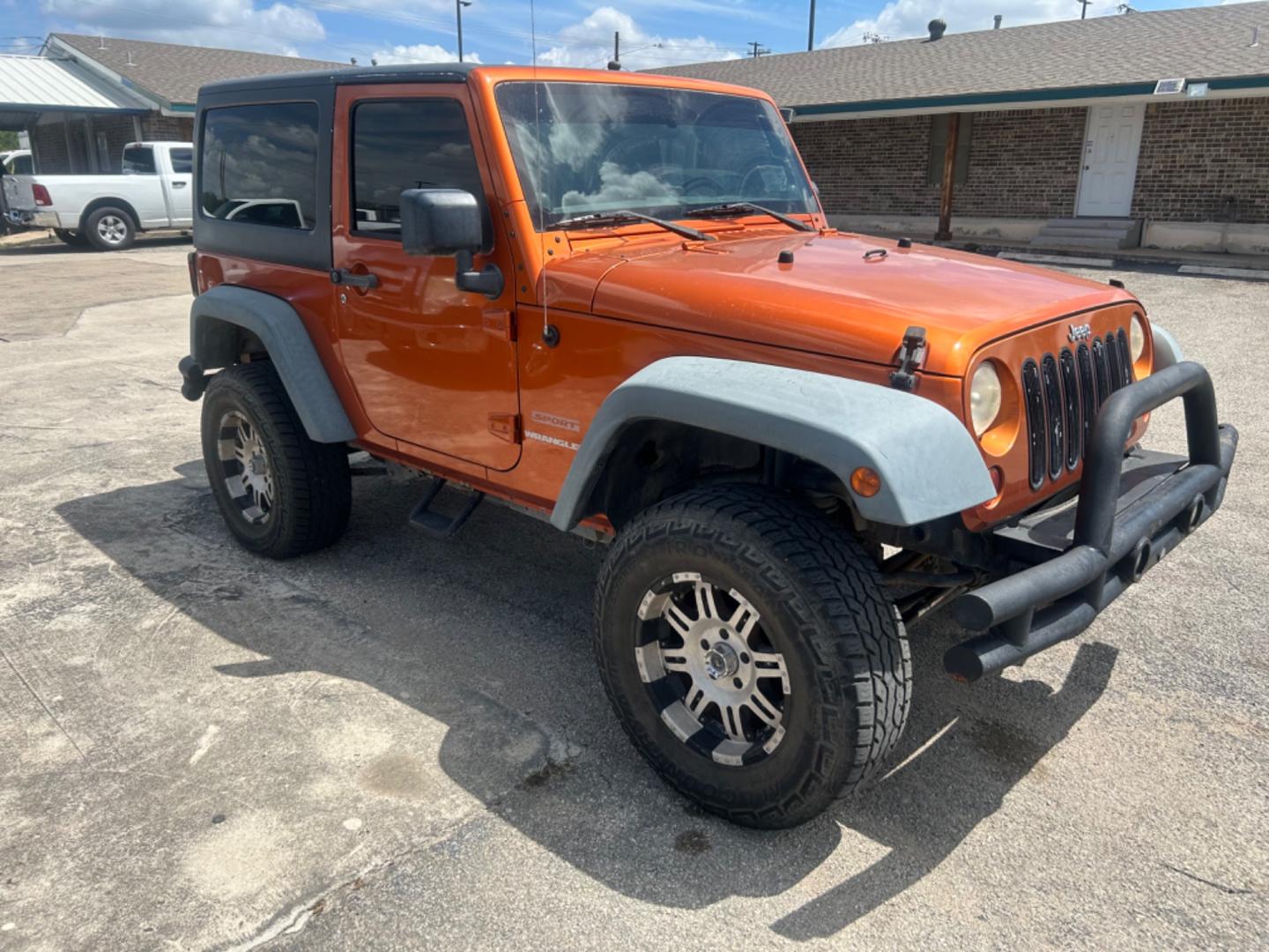 2011 Orange Jeep Wrangler Sport 4WD (1J4AA2D18BL) with an 3.8L V6 OHV 12V engine, Automatic transmission, located at 1687 Business 35 S, New Braunfels, TX, 78130, (830) 625-7159, 29.655487, -98.051491 - Photo#3