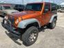 2011 Orange Jeep Wrangler Sport 4WD (1J4AA2D18BL) with an 3.8L V6 OHV 12V engine, Automatic transmission, located at 1687 Business 35 S, New Braunfels, TX, 78130, (830) 625-7159, 29.655487, -98.051491 - Photo#0