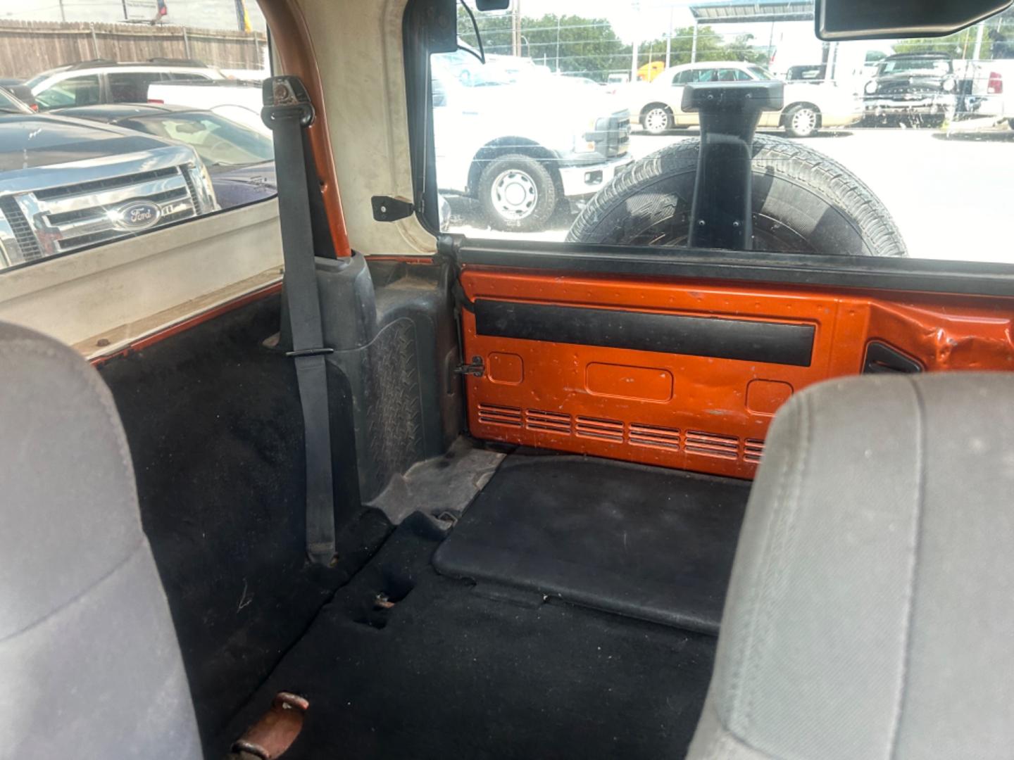 2011 Orange Jeep Wrangler Sport 4WD (1J4AA2D18BL) with an 3.8L V6 OHV 12V engine, Automatic transmission, located at 1687 Business 35 S, New Braunfels, TX, 78130, (830) 625-7159, 29.655487, -98.051491 - Photo#12