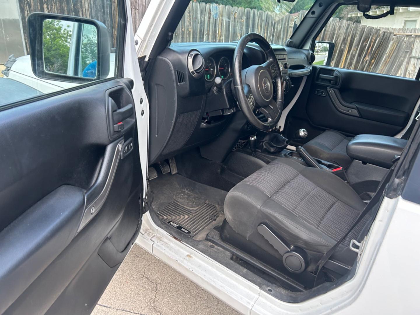 2012 White Jeep Wrangler Sport 4WD (1C4AJWAG0CL) with an 3.6L V6 DOHC 24V FFV engine, Standard transmission, located at 1687 Business 35 S, New Braunfels, TX, 78130, (830) 625-7159, 29.655487, -98.051491 - Photo#5