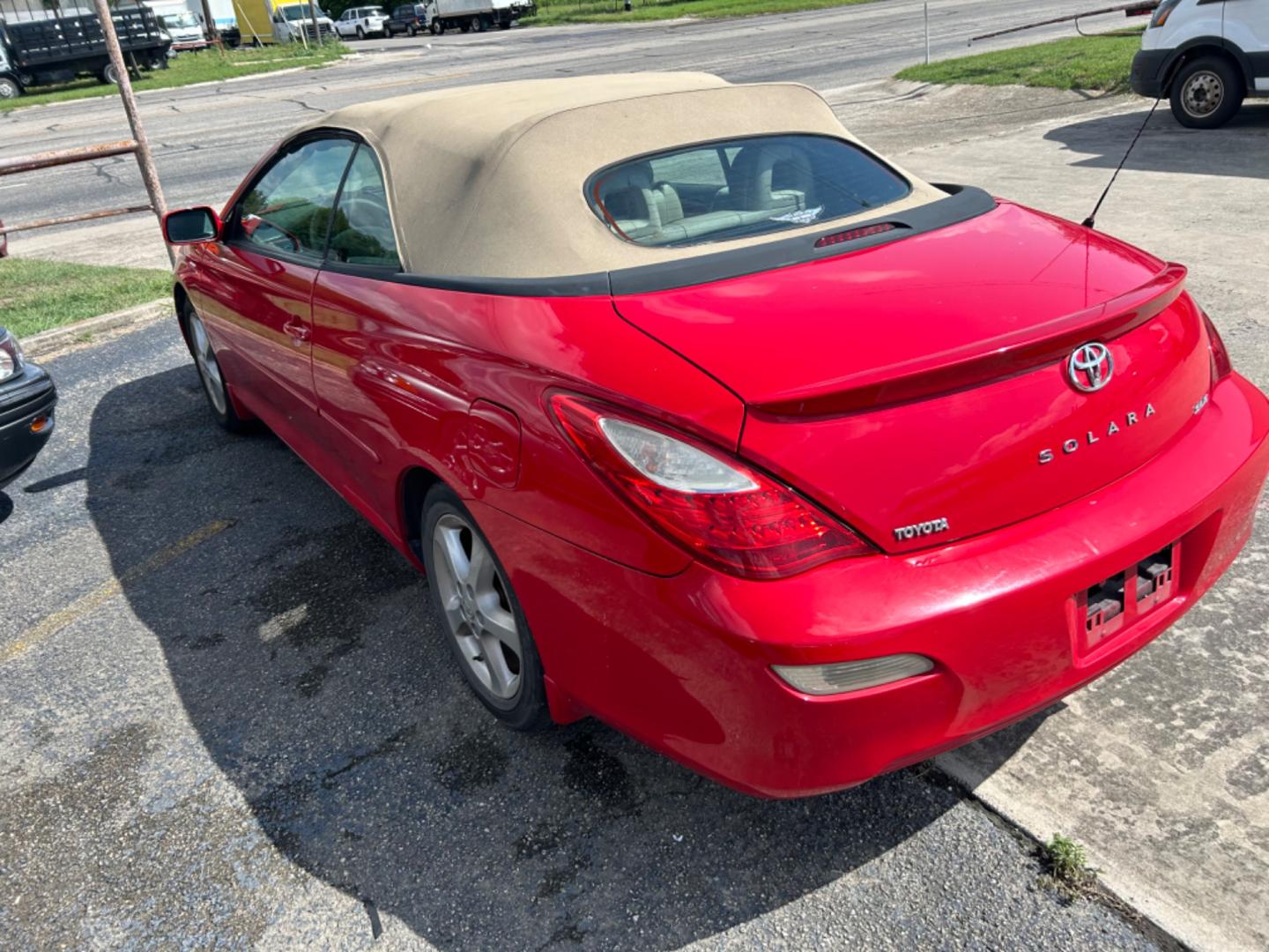 2007 Red Toyota Camry Solara SE Convertible (4T1FA38P77U) with an 3.3L V6 DOHC 24V engine, located at 1687 Business 35 S, New Braunfels, TX, 78130, (830) 625-7159, 29.655487, -98.051491 - Photo#3