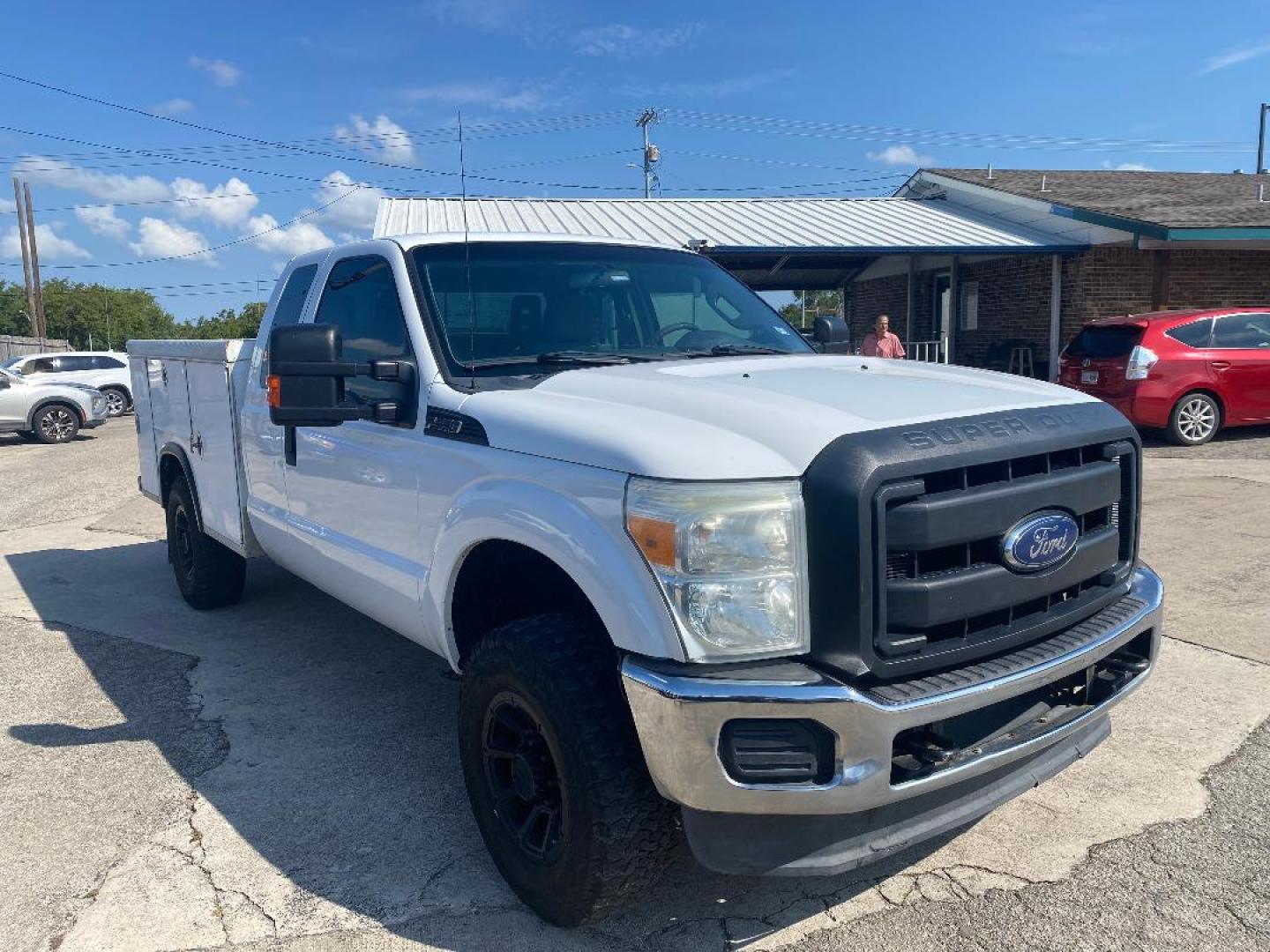 2014 White Ford F-250 SD XLT SuperCab Long Bed 4WD (1FT7X2B62EE) with an 6.2L V8 OHV 16V engine, 6-Speed Automatic transmission, located at 1687 Business 35 S, New Braunfels, TX, 78130, (830) 625-7159, 29.655487, -98.051491 - Photo#8