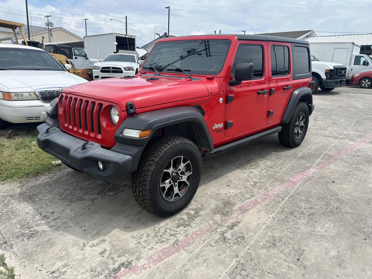 2019 Jeep Wrangler Unlimited Sport (1C4HJXDG5KW) with an 3.6L V6 DOHC 24V FFV engine, 6A transmission, located at 1687 Business 35 S, New Braunfels, TX, 78130, (830) 625-7159, 29.655487, -98.051491 - Photo#0