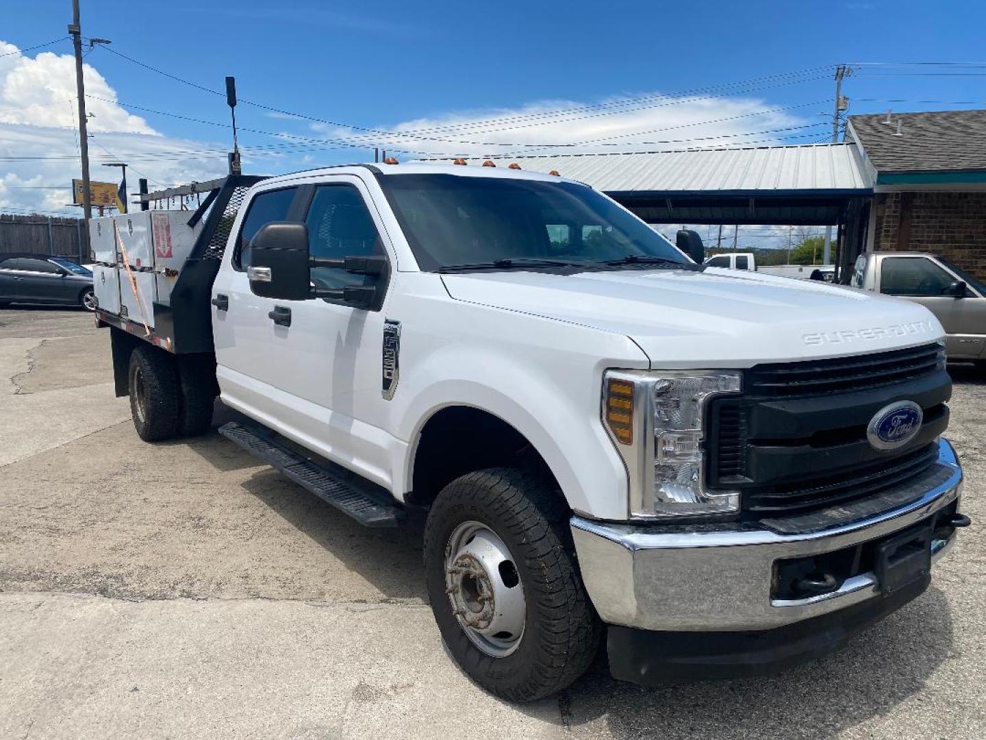 2019 White Ford F-350 SD XL Crew Cab Flat Bed DRW 4WD (1FD8W3H60KE) with an 6.2L V8 OHV 16V engine, 6A transmission, located at 1687 Business 35 S, New Braunfels, TX, 78130, (830) 625-7159, 29.655487, -98.051491 - Photo#2