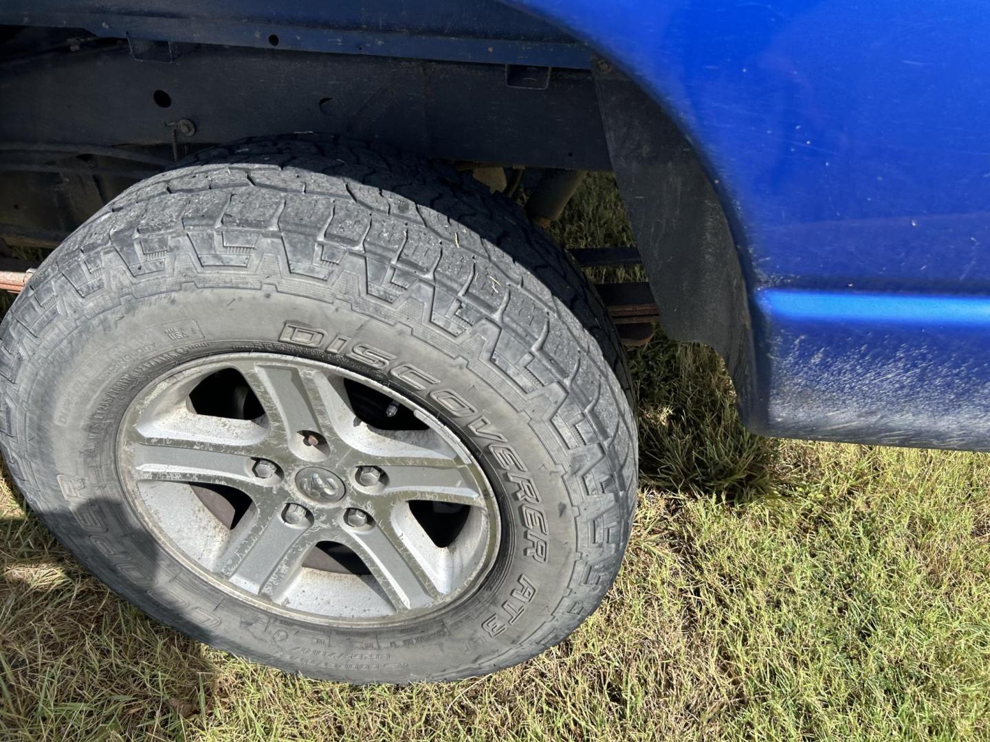 2007 Blue Dodge Ram 1500 Laramie Quad Cab 4WD (1D7HU182X7J) with an 5.7L V8 OHV 16V engine, 5-Speed Automatic Overdrive transmission, located at 1687 Business 35 S, New Braunfels, TX, 78130, (830) 625-7159, 29.655487, -98.051491 - Photo#11