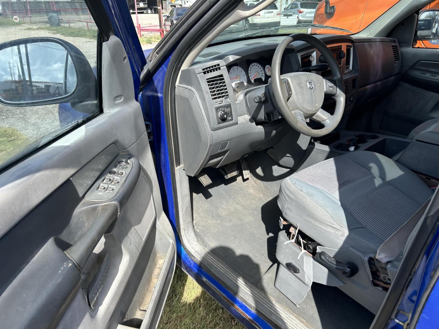 2007 Blue Dodge Ram 1500 Laramie Quad Cab 4WD (1D7HU182X7J) with an 5.7L V8 OHV 16V engine, 5-Speed Automatic Overdrive transmission, located at 1687 Business 35 S, New Braunfels, TX, 78130, (830) 625-7159, 29.655487, -98.051491 - Photo#13