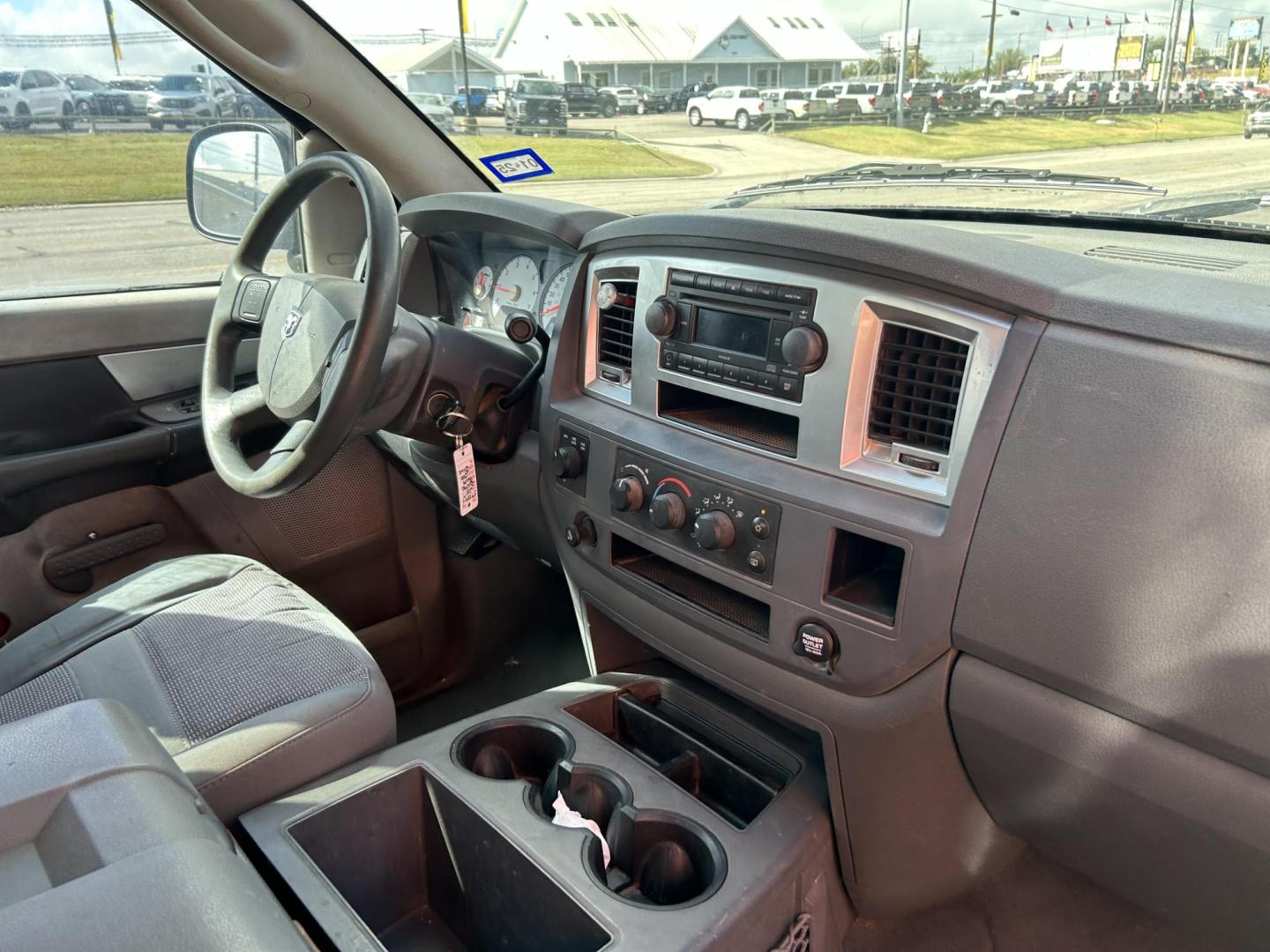 2007 Blue Dodge Ram 1500 Laramie Quad Cab 4WD (1D7HU182X7J) with an 5.7L V8 OHV 16V engine, 5-Speed Automatic Overdrive transmission, located at 1687 Business 35 S, New Braunfels, TX, 78130, (830) 625-7159, 29.655487, -98.051491 - Photo#3